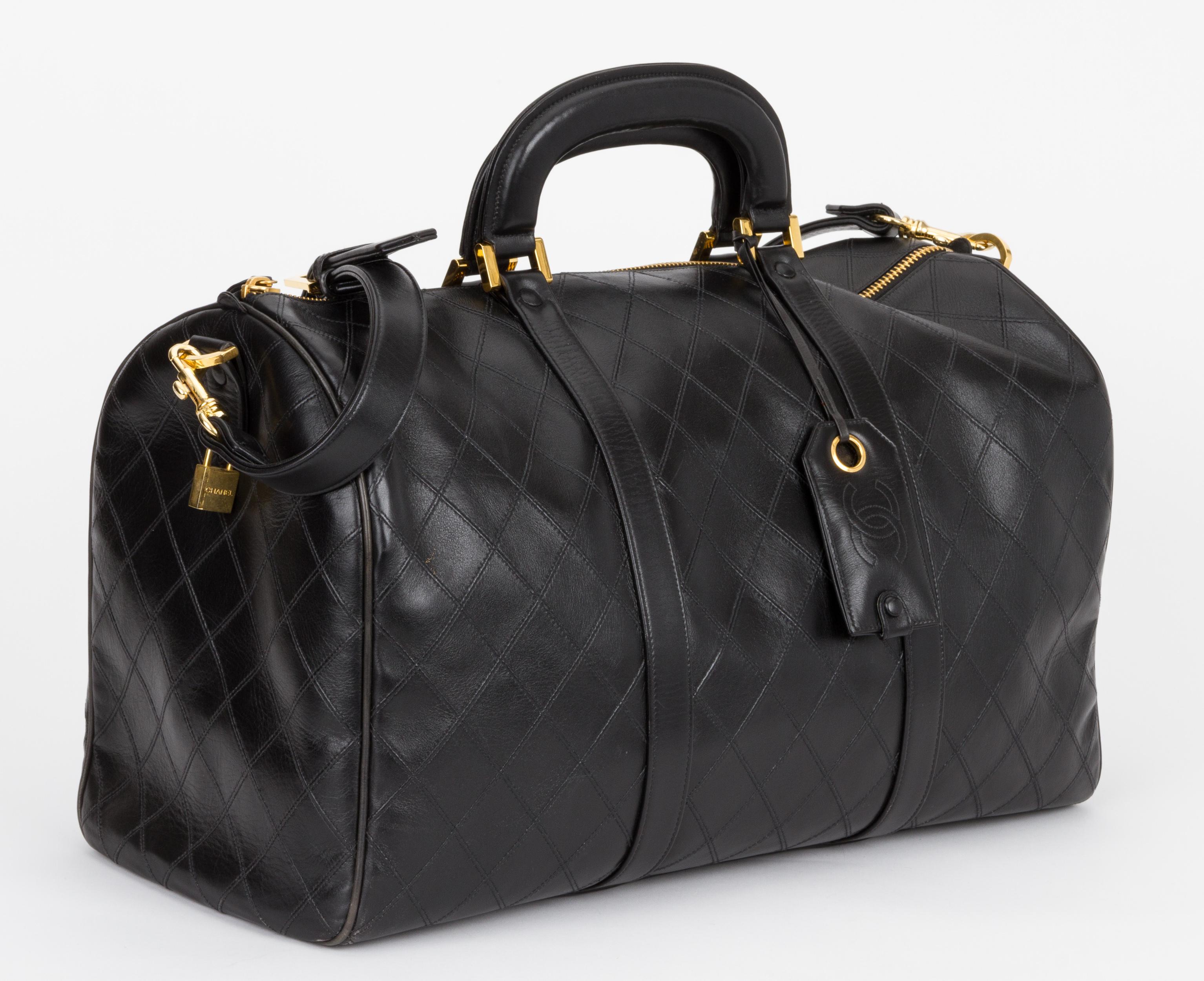Chanel rare diamond quilting unisex black duffle bag with gold tone hardware. Handle drop 5