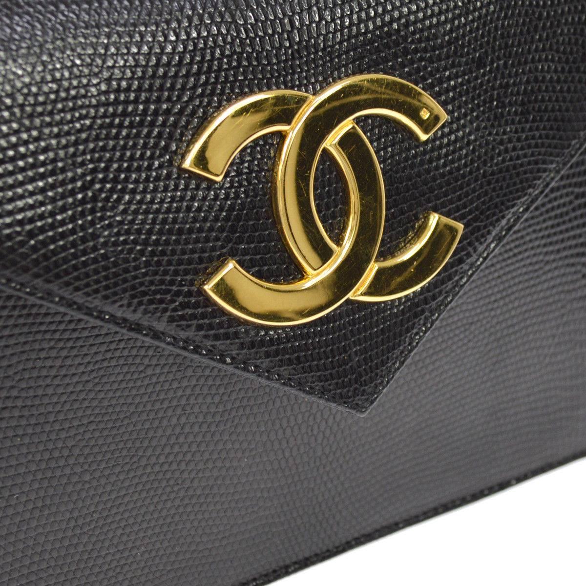 Chanel Rare Black Exotic Leather Gold Hardware Logo Evening Shoulder Flap Bag

Lizard leather
Gold tone hardware
Leather lining 
Date code present
Made in France
Shoulder strap drop 20