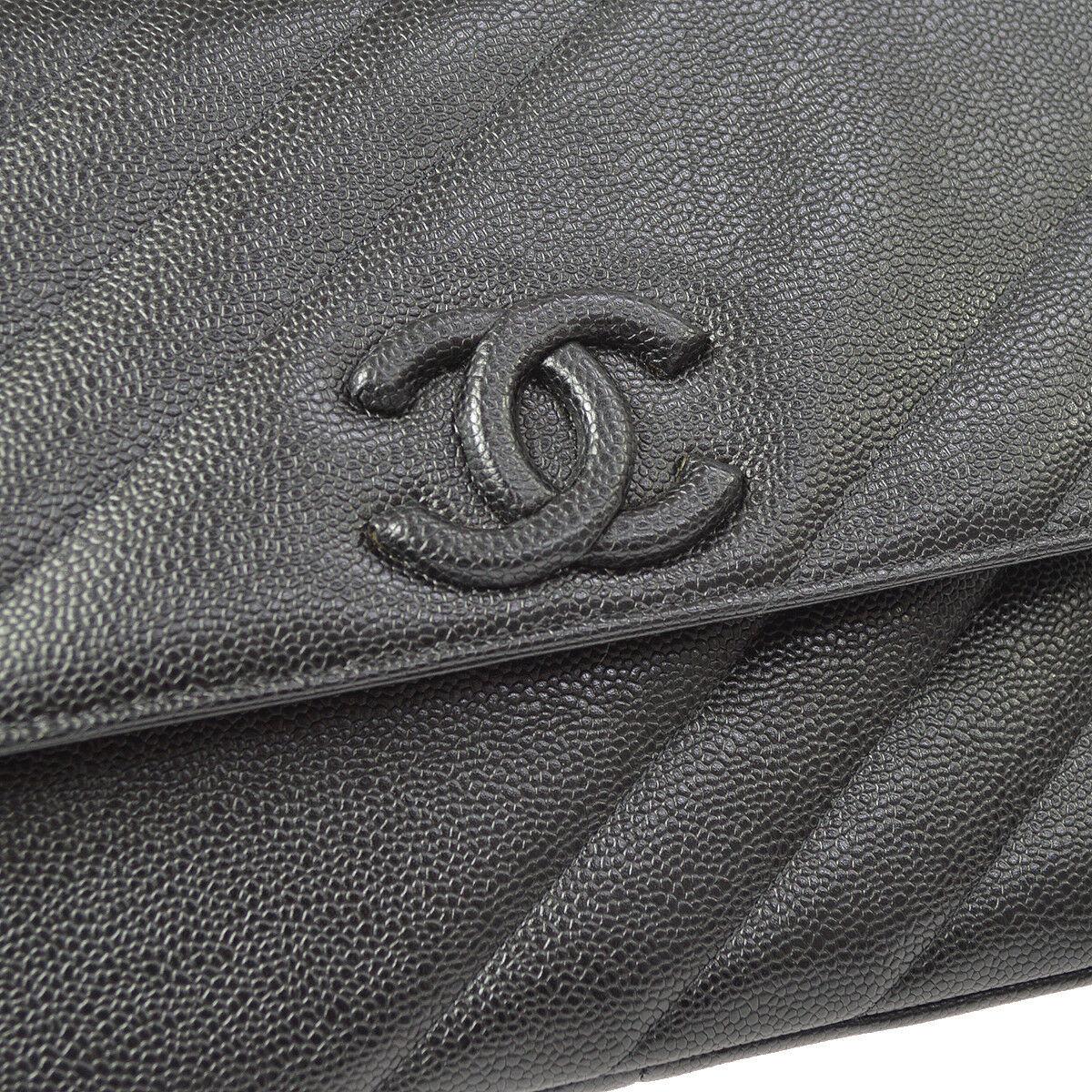 Chanel Rare Black Leather Chevron Jumbo Gold Evening Shoulder Flap Bag

Caviar leather 
Gold tone hardware
Leather lining
Date code present
Single shoulder strap drop 14