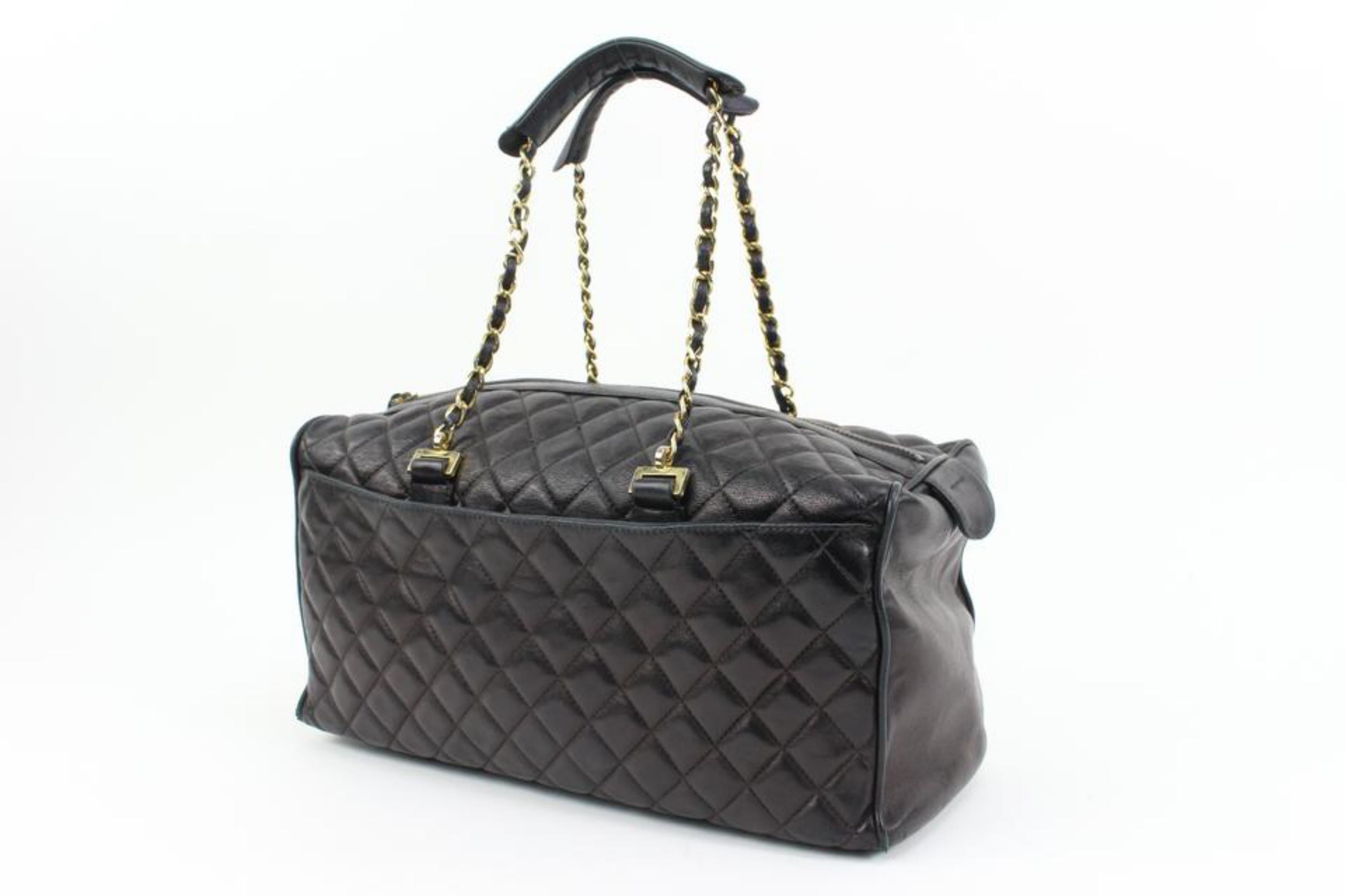 Chanel Rare Black Quilted Lambskin Boston Gold Chain Duffle 38ck311s
Made In: Italy
Measurements: Length:  13