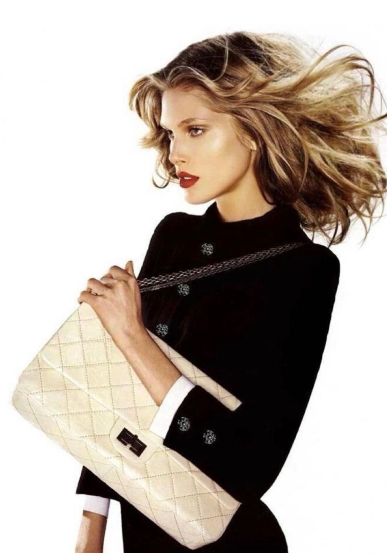 Collectors Chanel little black jacket with masterpiece CC jewel Gripoix buttons & signature quilting ~ from 2006 Fall Collection by Karl Lagerfeld
As seen in Ad Campaign and on many celebs!
- detachable cuffs
- black silk lining
Size mark 36 FR /