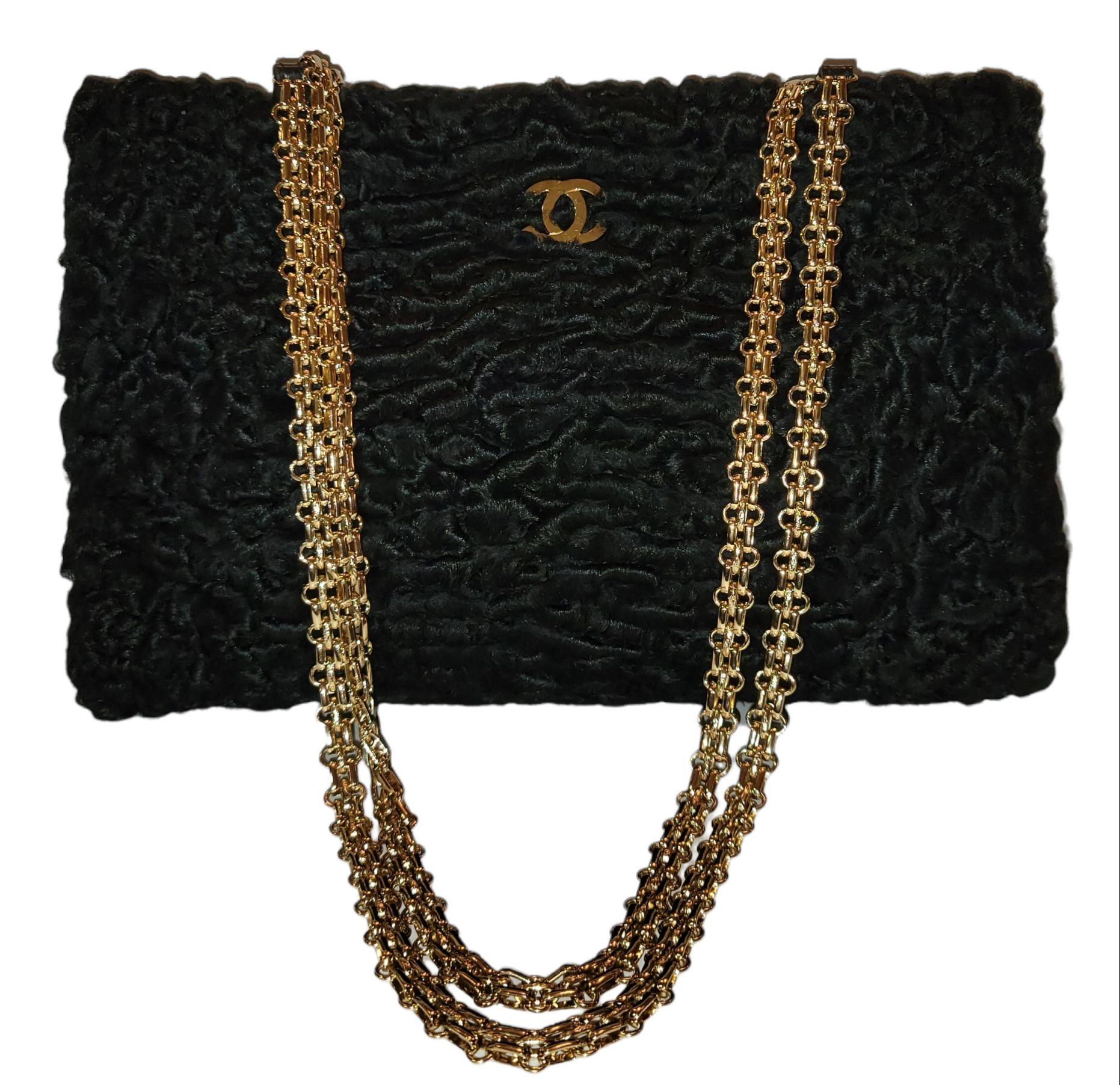 Authentic Rare Chanel Baby Persian Lamb Shoulder Bag Clutch Gold Hardware.

Soft all over baby Persian lamb fur flap bag. There is a gold hardware CC buckle in front of the bag. Leather and gold hardware chain. Soft black color leather on the