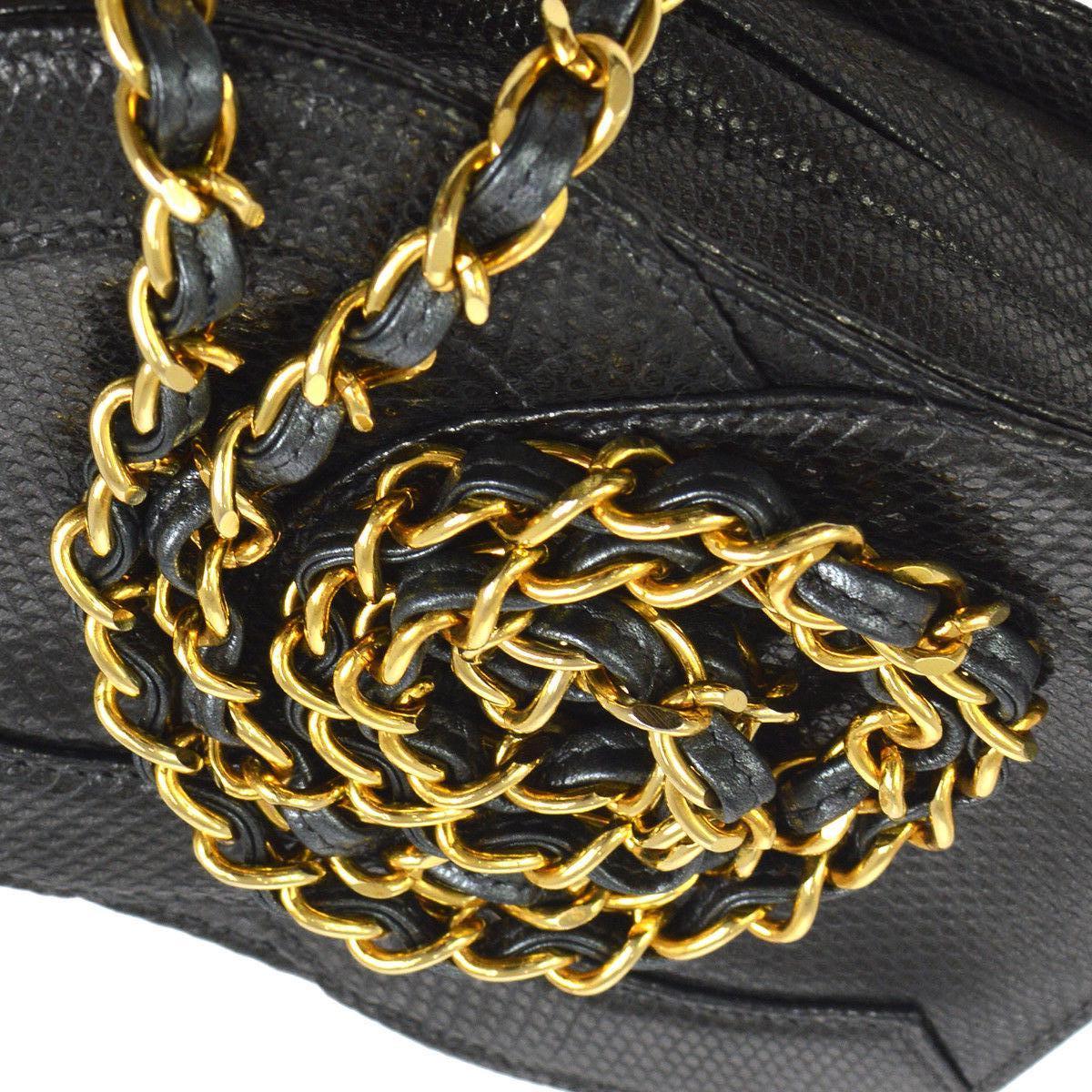Chanel Rare Lizard Leather Gold Evening Small Party CC Shoulder Flap Bag

Lizard
Leather
Leather lining
Date code present
Gold tone hardware
Measures 6.25