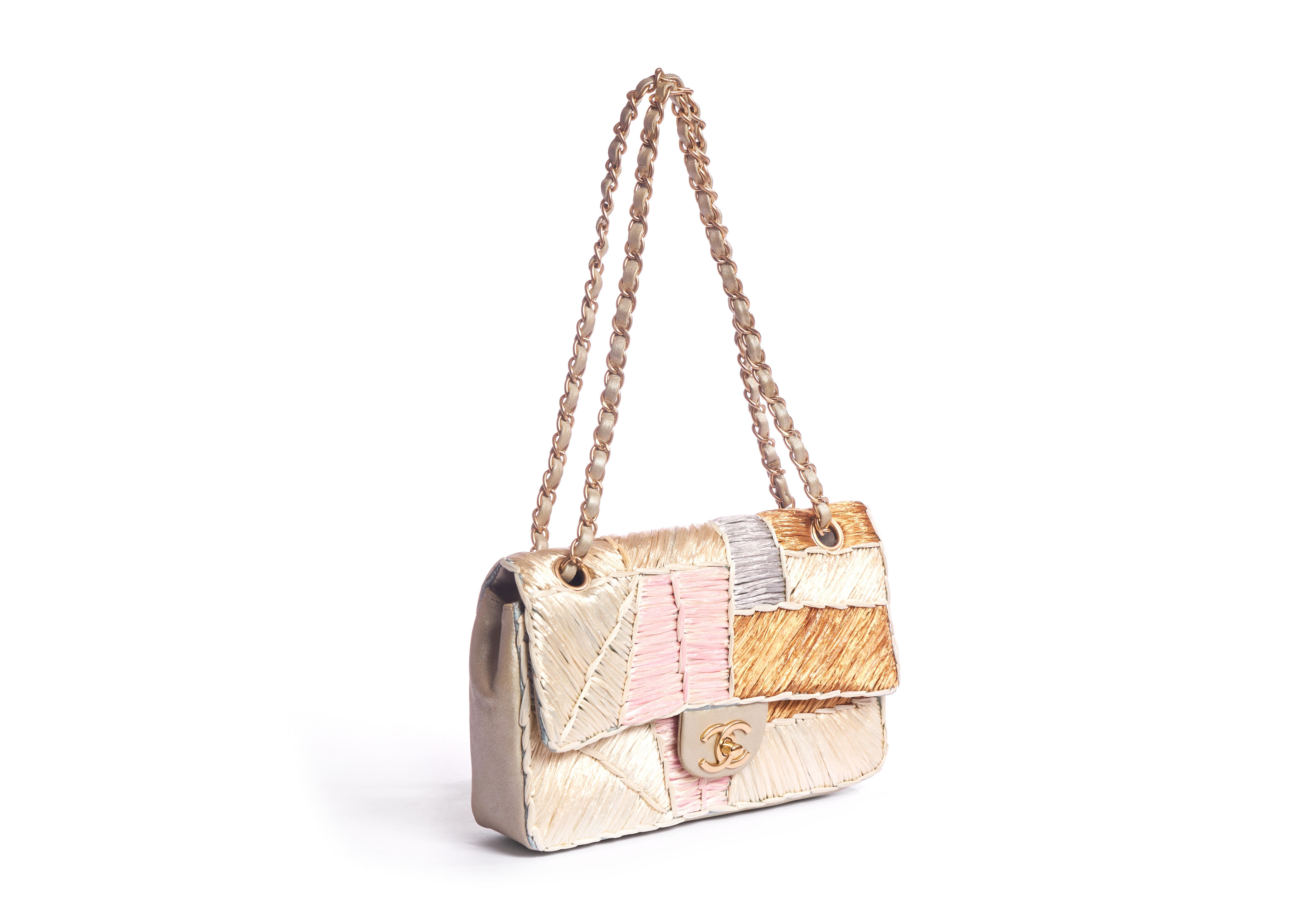 Chanel rare and collectible raffia single flap bag with gold tone hardware. Shoulder drop 9.5