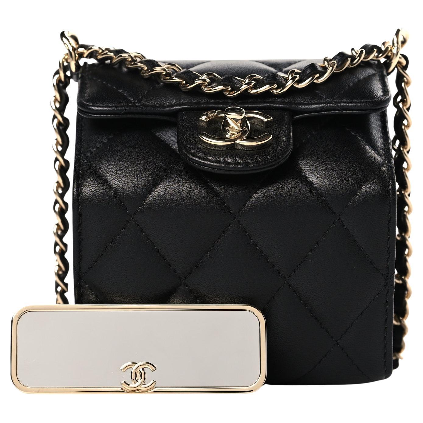 Chanel Rare Roll Up Accordion Mini Flap Bag Jewelry Box Quilted Leather Bag

Gold hardware

Black quilted lambskin
Leather and chain-link shoulder strap
Foldover top
Signature interlocking CC turn-lock fastening
Main compartment
Partitioned