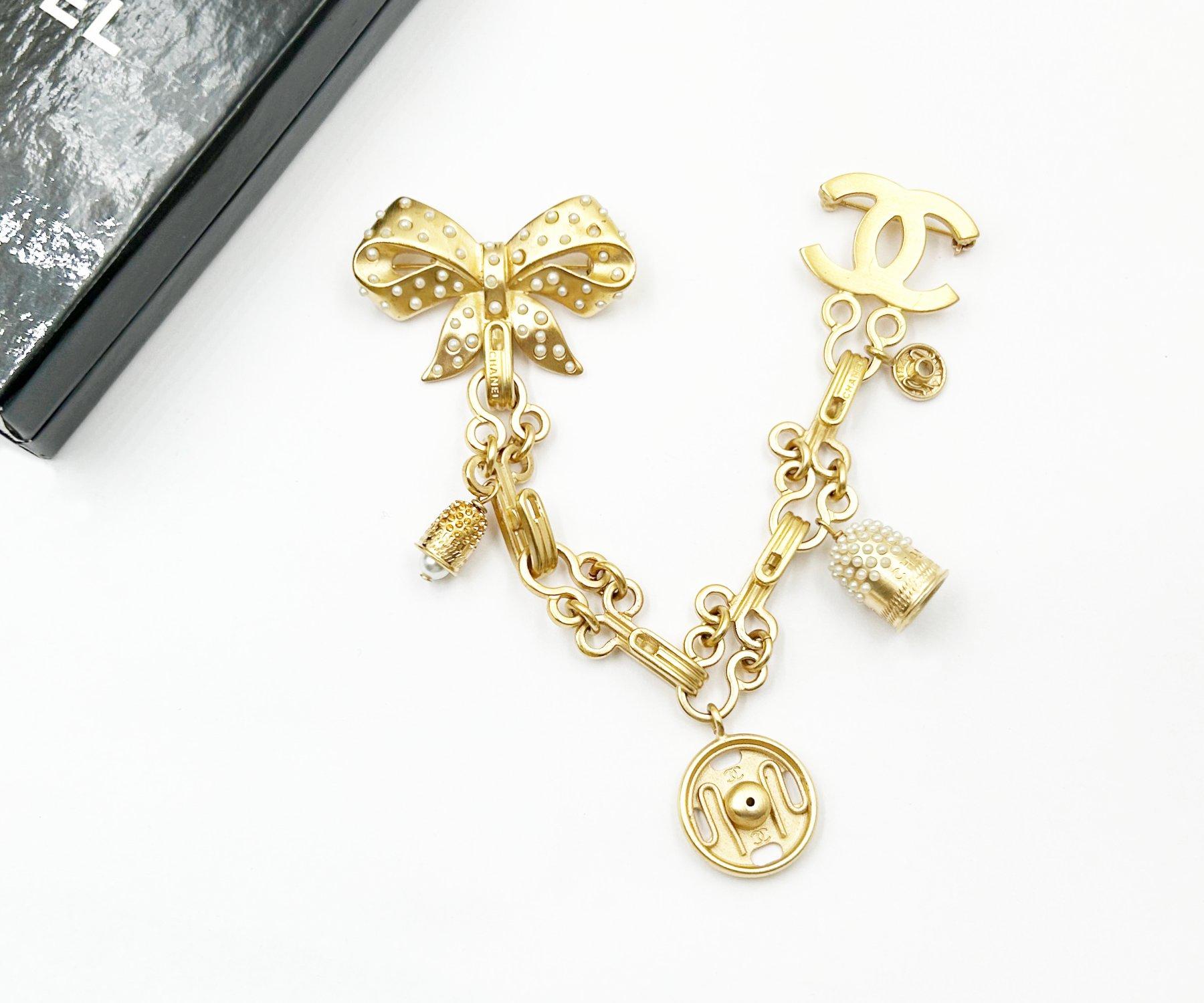Artisan Chanel Rare Vintage Gold CC Ribbon Pearl Thimble Brooch Pin