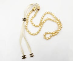 Chanel Rare Vintage Gold Plated CC Black Crystal Golden Pearl Tie Necklace