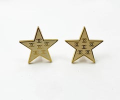 Chanel Rare Vintage Gold Plated CC Ivory Enamel Star Large Clip on Earrings