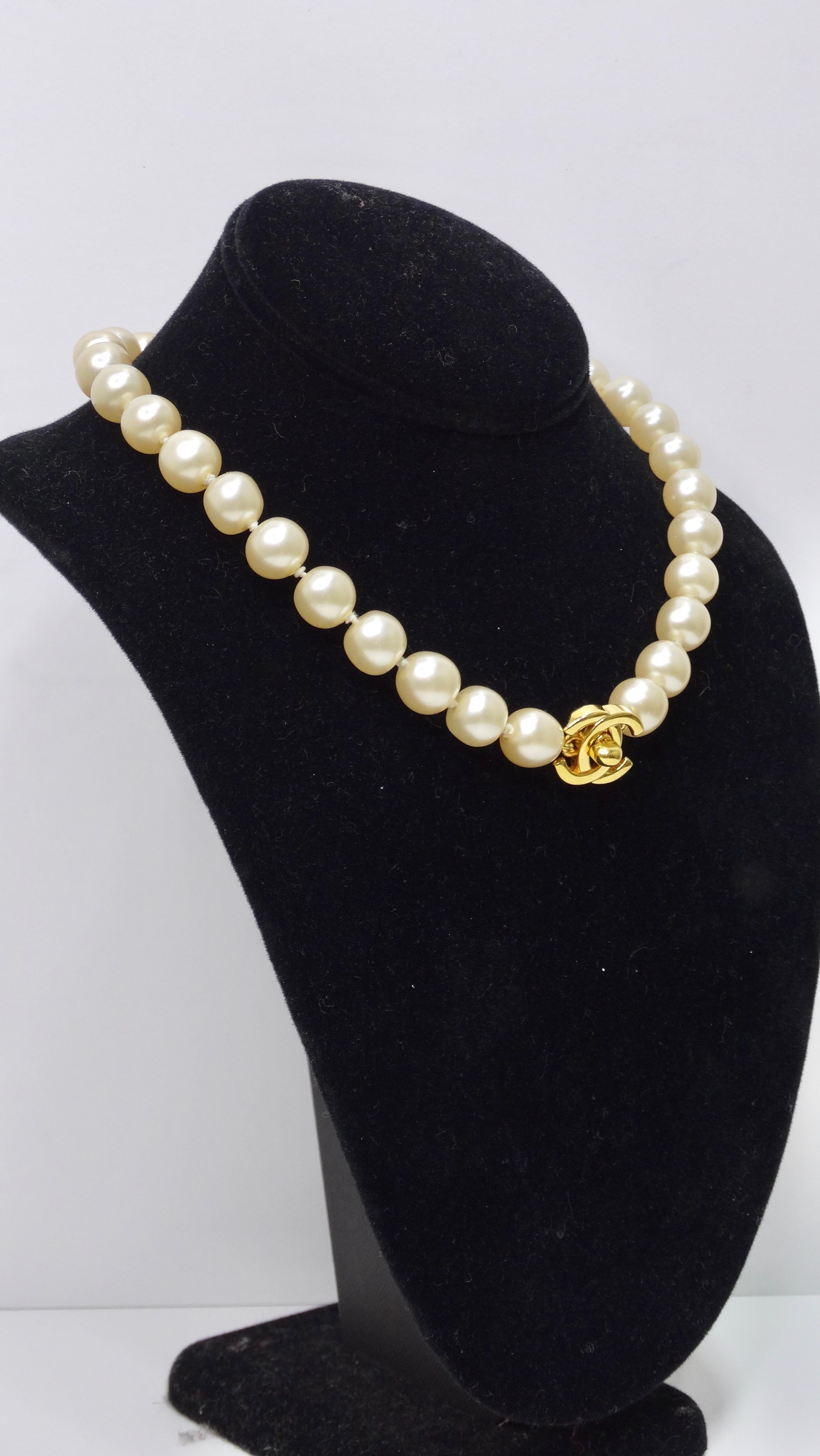 Dip your toe into the world of Chanel with this beautifully classic and highly rare necklace! This is a vintage piece from the 1996 Spring collection that is in pristine condition. It features plump and irregular glass faux peal beads that are