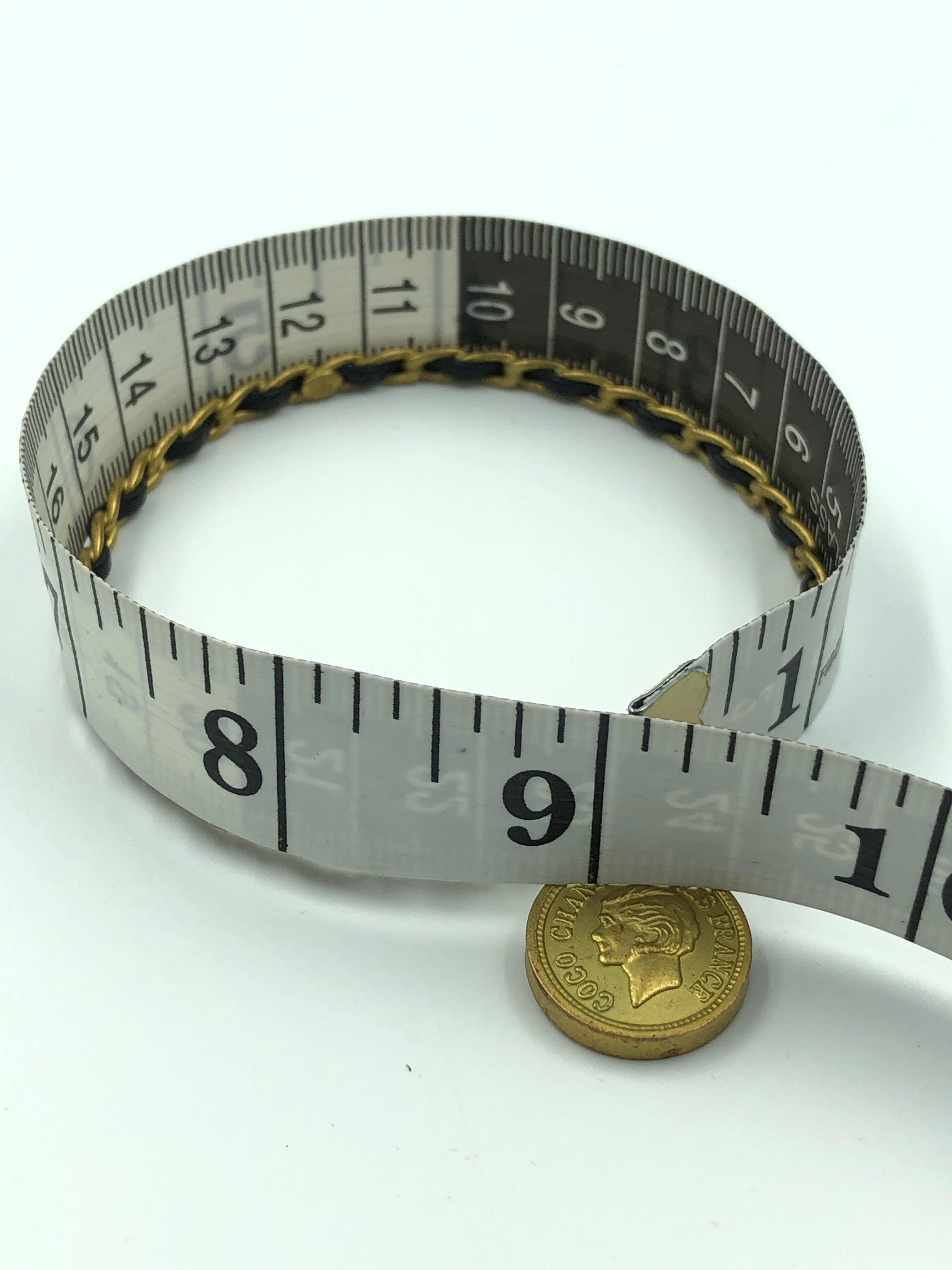 Chanel Rare Vintage Twisted Gold Metal and Leather Bracelet with hanging Chanel  In Good Condition For Sale In Los Angeles, CA