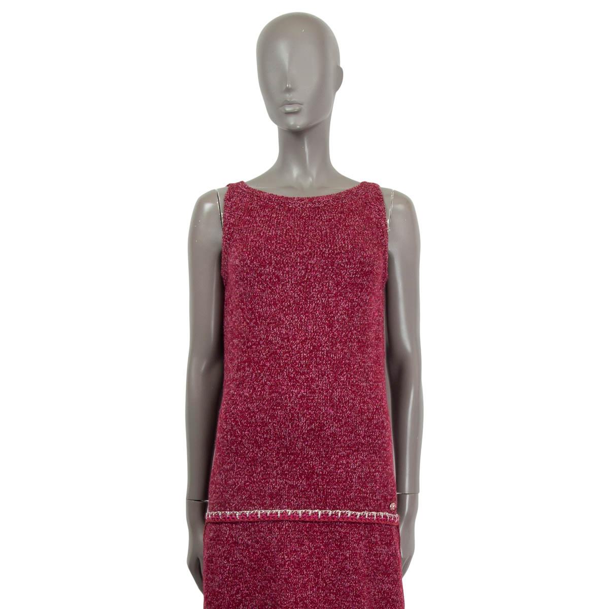 100% authentic Chanel 2016 crochet trim sleeveless knit dress in raspberry cashmere (81%) and silk (19%). Features zipped sides, a drop waist and a pink 'CC' emblem at the front. Semi-lined in raspberry silk (100%). Brand new, with tags.

Matching