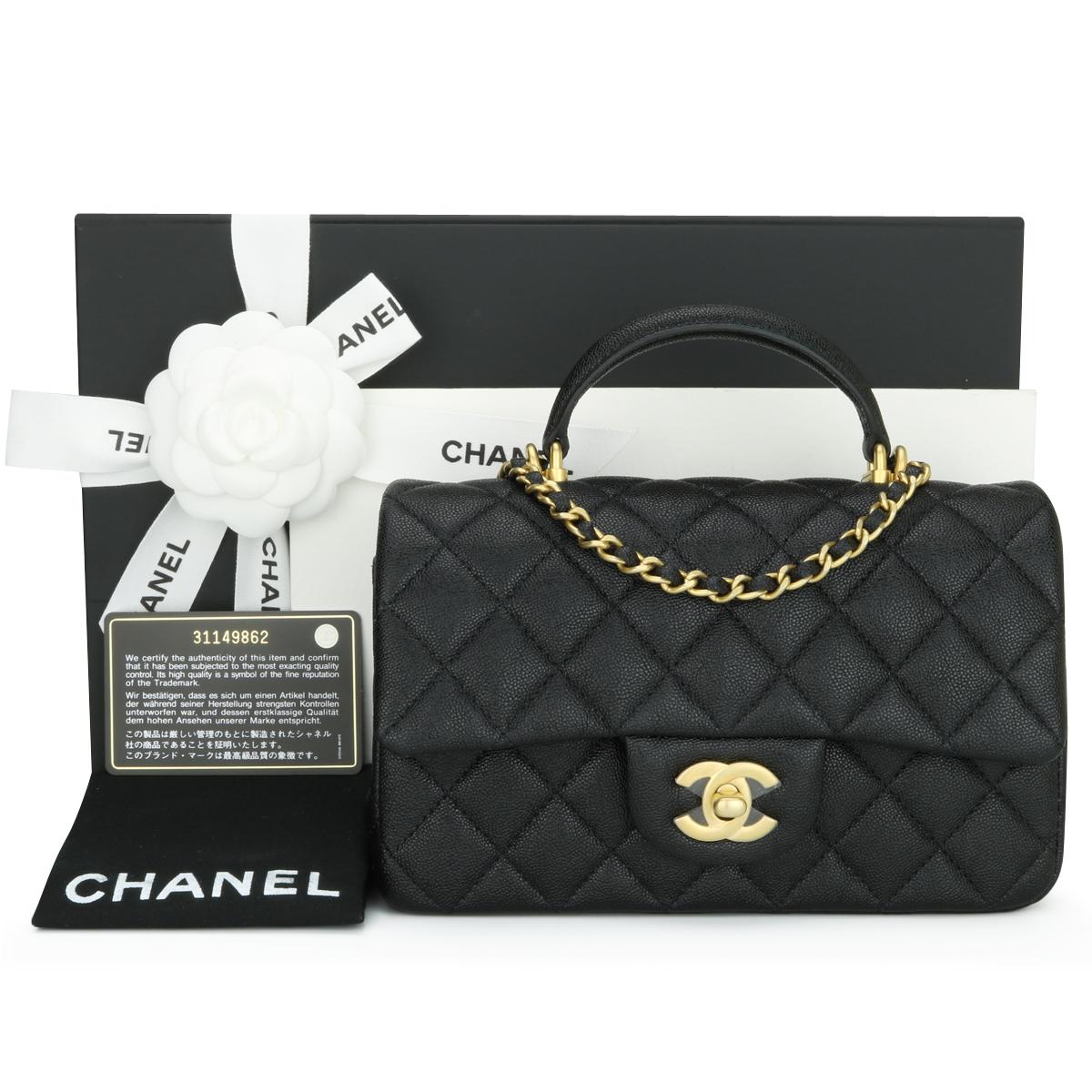 CHANEL Rectangular Mini Top Handle Flap Bag Black Caviar with Brushed Gold Hardware 2021.

This stunning bag is still in brand new condition; the bag still holds the original shape, and the hardware is still shiny.

An extremely rare piece since
