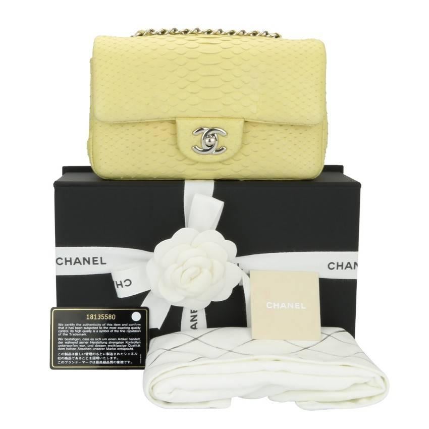 CHANEL Rectangular Mini, Yellow Python with Silver Hardware 2014 Limited Edition.

This bag has been sold out everywhere and it is really difficult to find one in this condition. A truly stunning colour combination. 

Conditions Details : Exterior