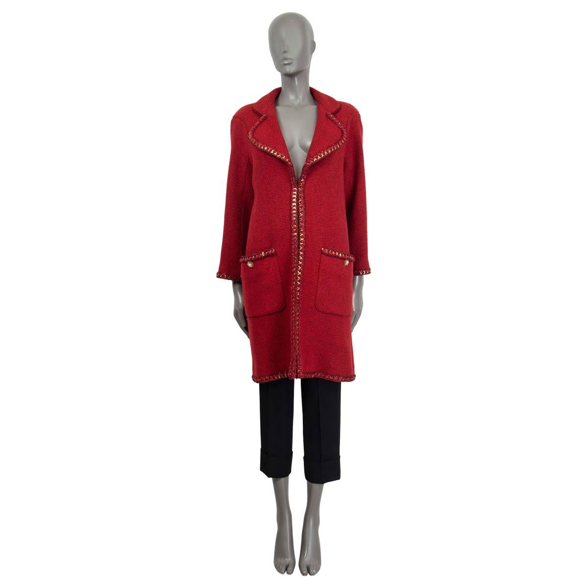 100% authentic Chanel tweed coat in red alpaca (76%), wool (19%) and nylon (5%). Features a chain trim, buttoned sleeves and two buttoned patch pockets on the front. Opens with one hook on the front. Lined in red silk (100%). Has been worn and is in