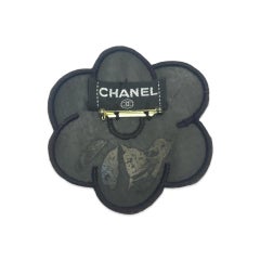 Chanel red and black camellia vinyl brooch
