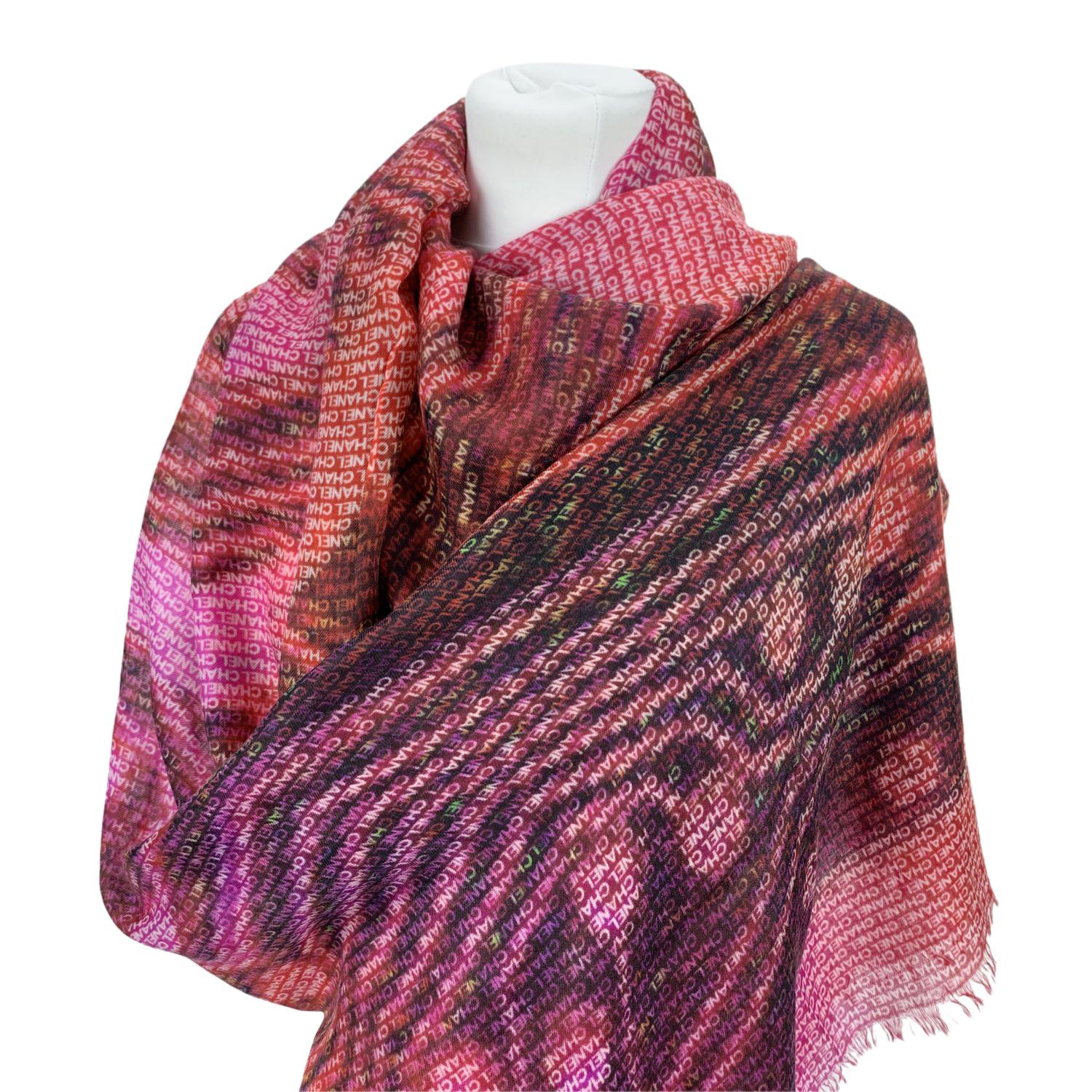 Chanel cashmere large scarf with and allover Chanel signature print in red and purple color. Frayed edges. Composition: 100% Cashmere. Measurements: 79 x 54 inches - 200.7 cm x 137.16 cm. Made in Italy

Details

MATERIAL: Cashmere

COLOR: