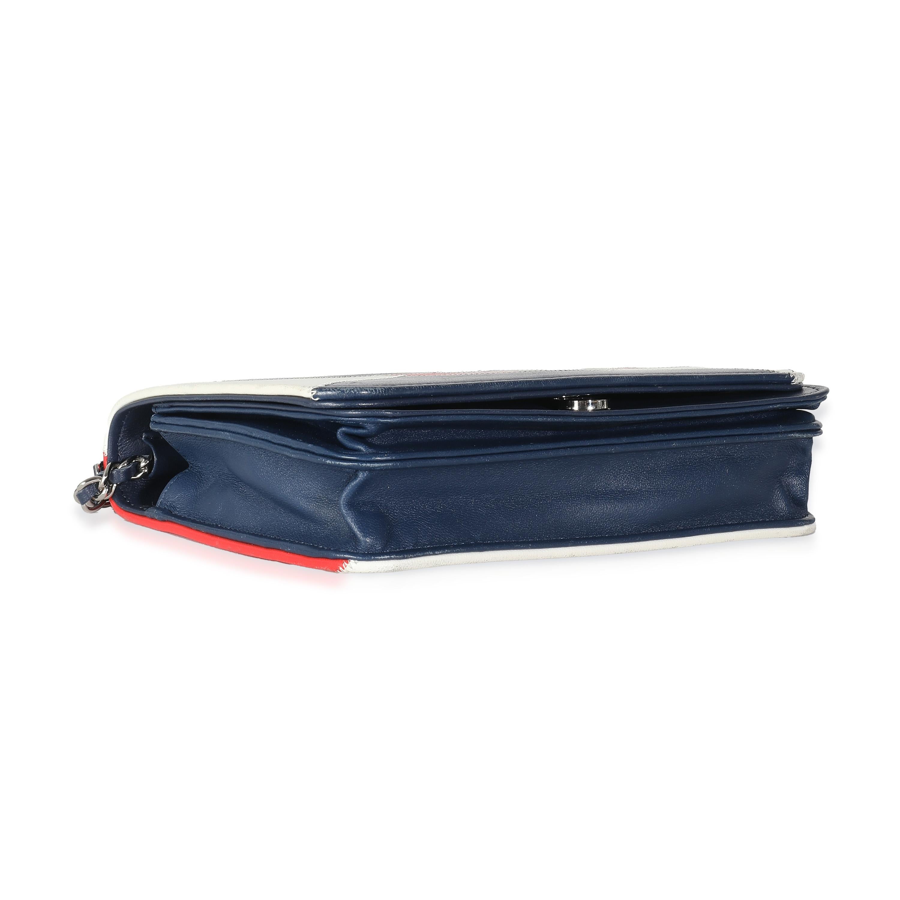 Listing Title: Chanel Red Blue White Lambskin Patchwork CC Flap Bag
SKU: 139572
Condition: Pre-owned 
Condition Description: A timeless classic that never goes out of style, the flap bag from Chanel dates back to 1955 and has seen a number of