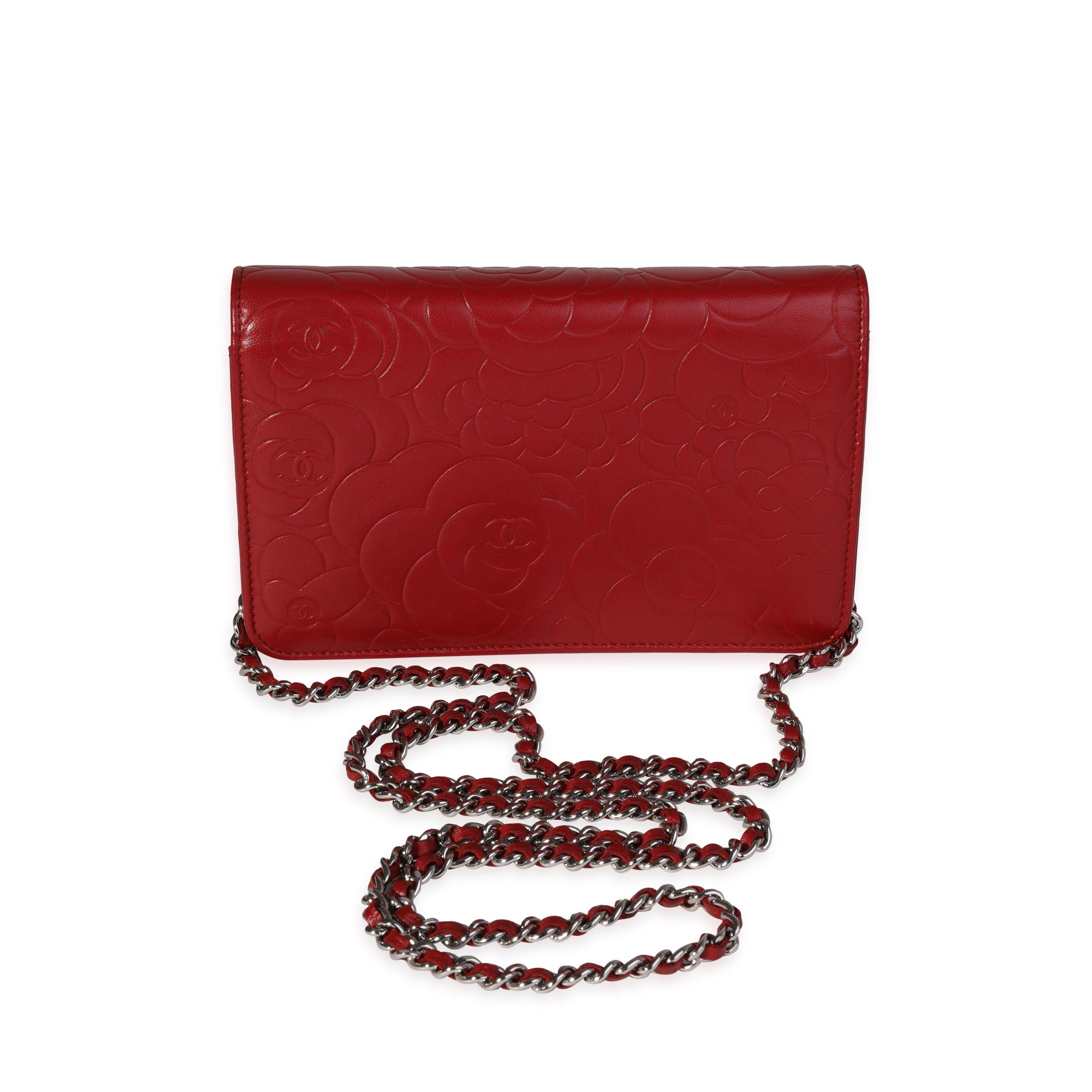 Listing Title: Chanel Red Camellia-Embossed Leather Wallet on Chain
SKU: 121360
Condition: Pre-owned (3000)
Handbag Condition: Very Good
Condition Comments: Very Good Condition. Light scuffing to corners. Light scratching to hardware. Light scuffing