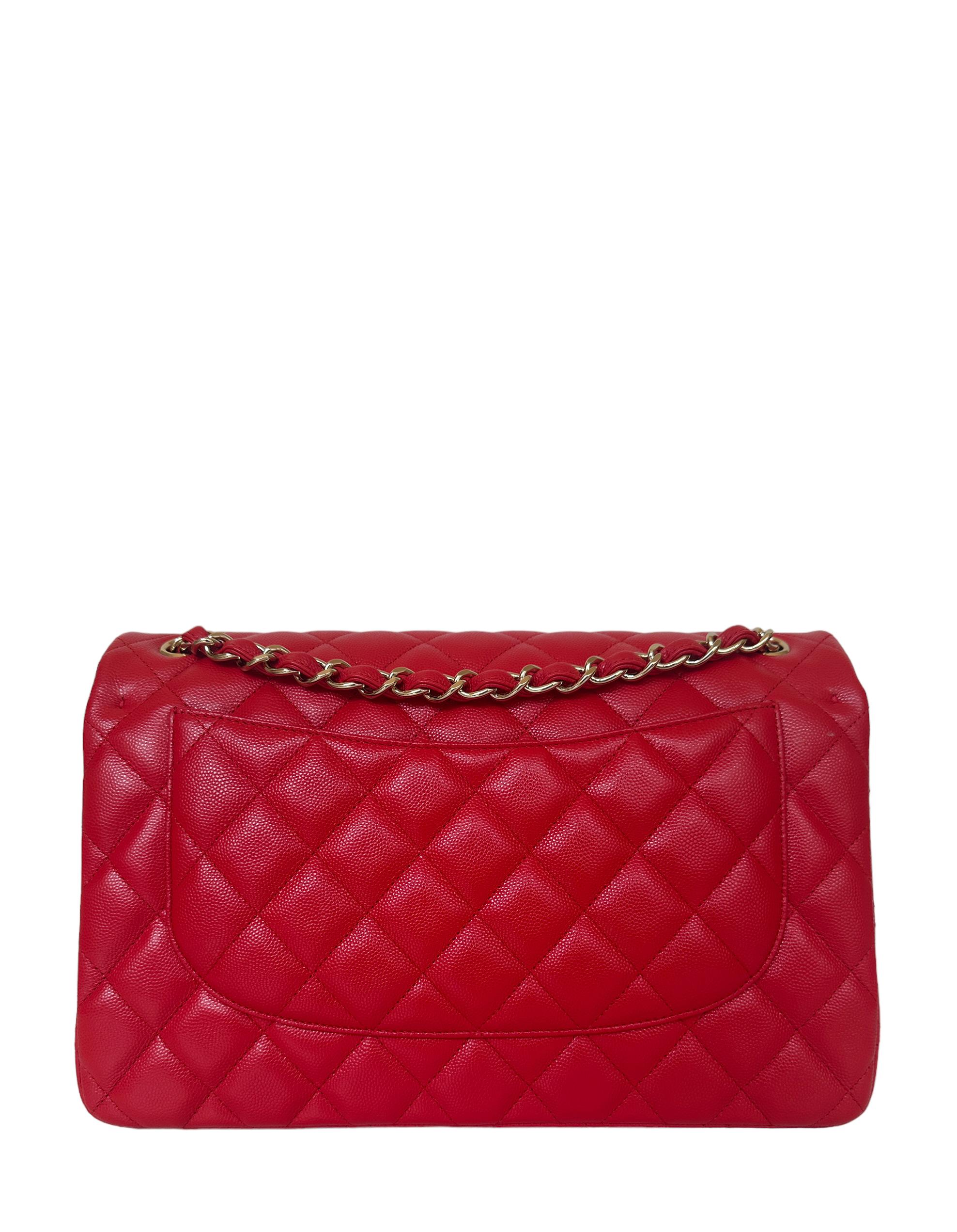 Chanel Red Caviar Leather Quilted Classic Double Flap Jumbo Bag. Glazed caviar leather adds a shine to the rich red color

Made In: Italy
Year of Production: 2021
Color: Red 
Hardware: Goldtone
Materials: Glazed caviar Leather
Lining: Red