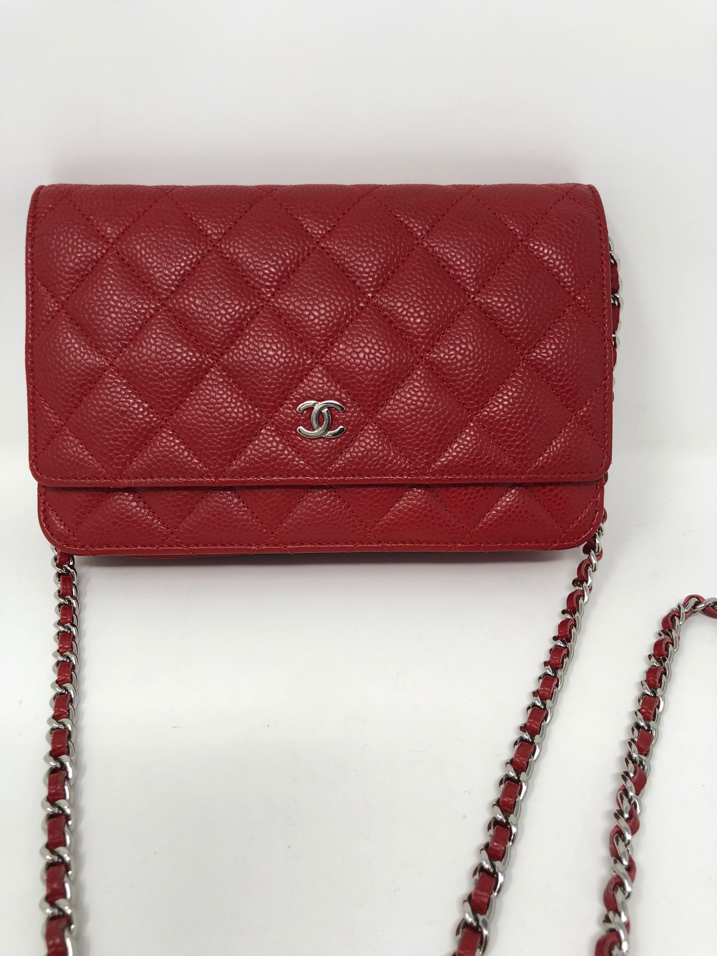 Chanel Red Caviar Wallet On A Chain Bag. Silver hardware. Can be worn as a crossbody or a clutch. Excellent condition. Includes dust cover. Guaranteed authentic. 
