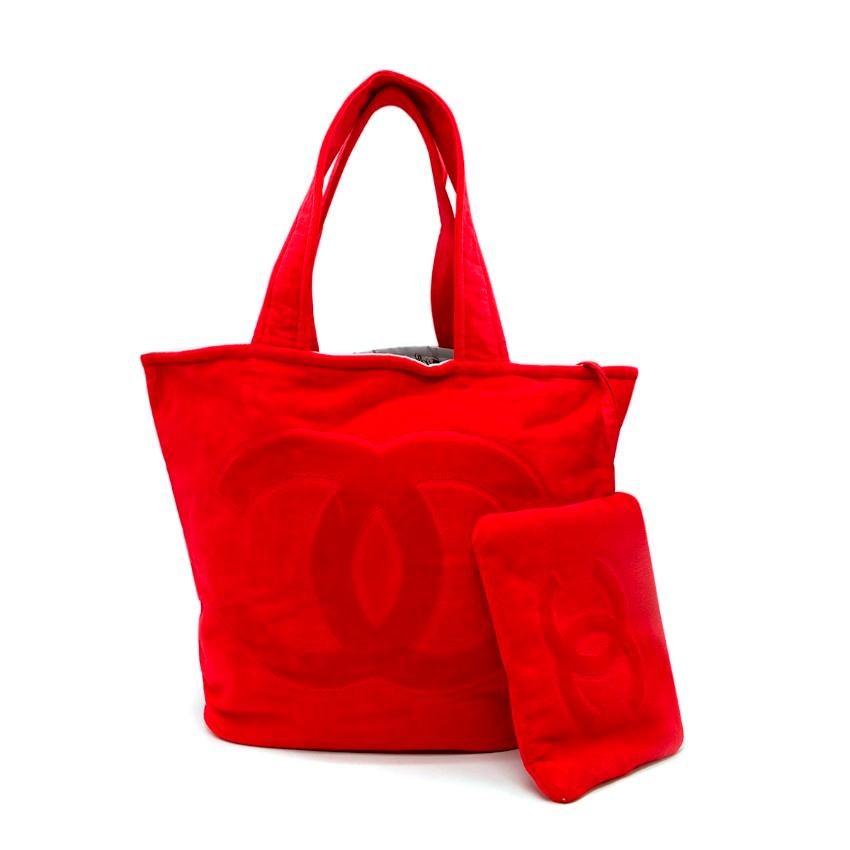 Chanel Red CC Terry Cotton Beach Bag & Towel Set

- Playful cotton terry towelling beach set rendered in vibrant cherry red, featuring a whimsical accessories print
- Set comprises beach tote, zip pouch and beach towel
- Soft unstructred, open tote