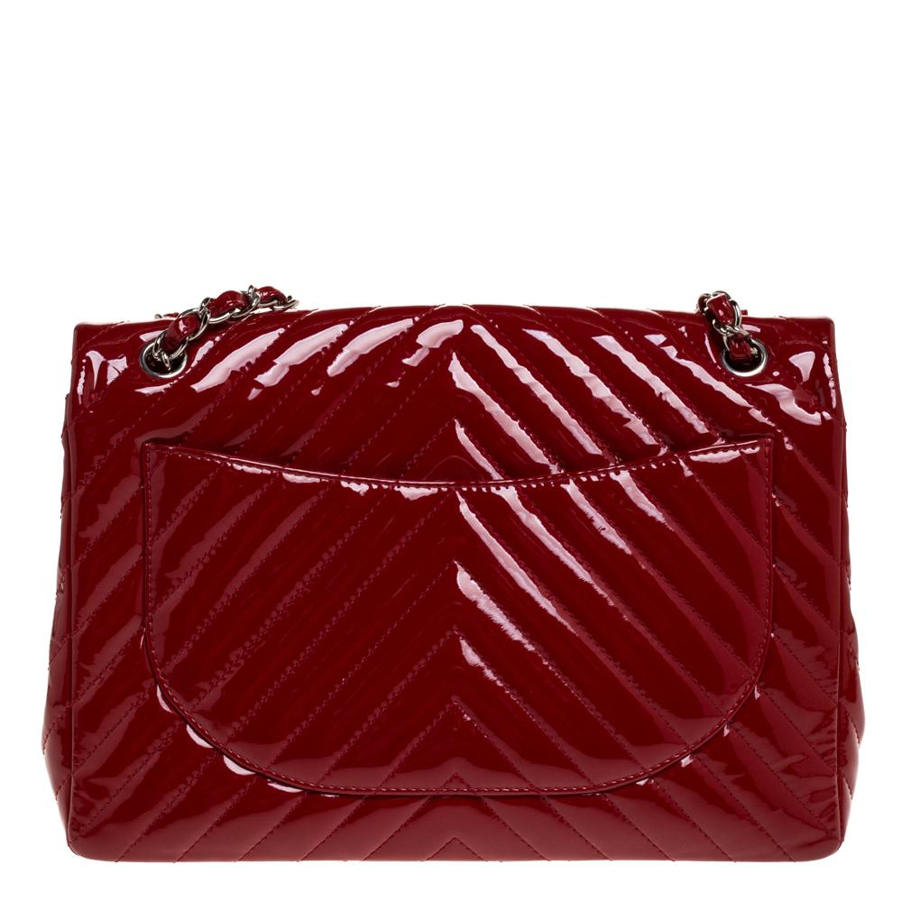 We are in utter awe of this flap bag from Chanel as it is appealing in a surreal way. Exquisitely crafted from patent leather in chevron quilt design, it bears their signature label on the leather interior and the iconic CC turn-lock on the flap.