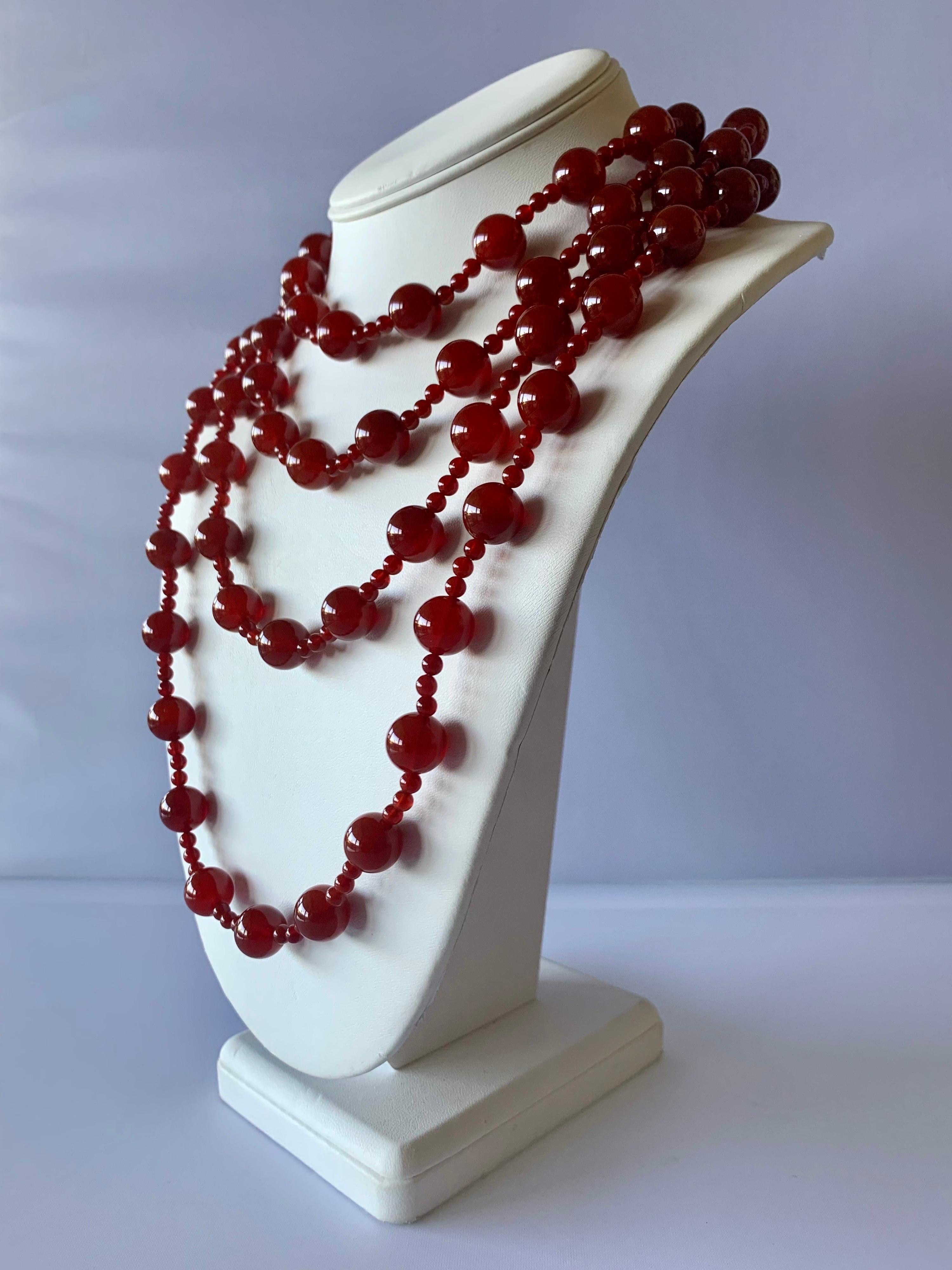 Scarce vintage Chanel beaded necklace - comprised out of large red glass beads by Gripoix, the necklace can be wrapped around the neck up to four times. Signed Chanel.