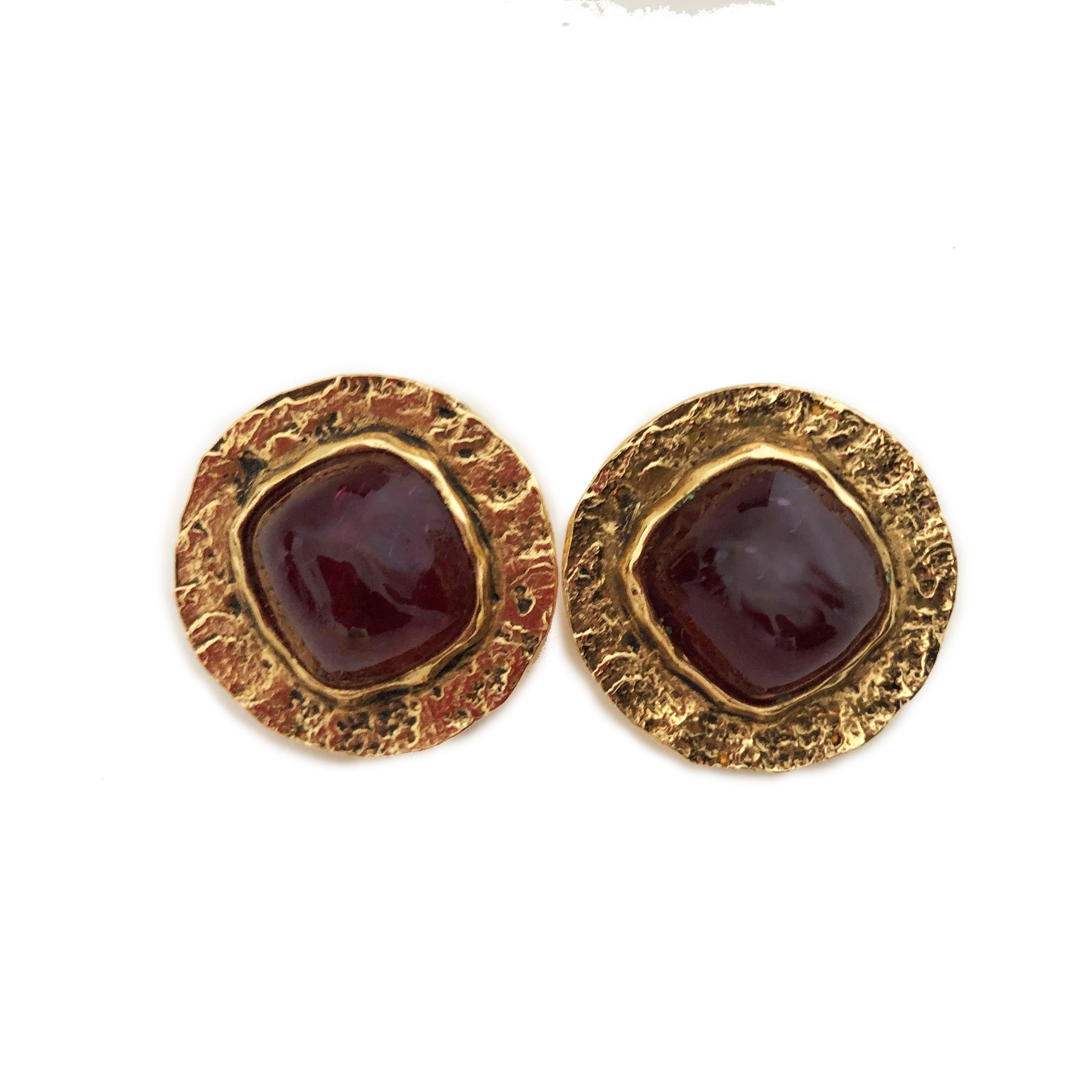 Chanel Red Glass Earrings with Hammered Gold Setting, made by Goossens for Chanel in the 70s.  Clip Style. Acquired from the estate of a Palm Beach retiree who once worked for Chanel in Paris.  Preowned/vintage with signs of use/wear: