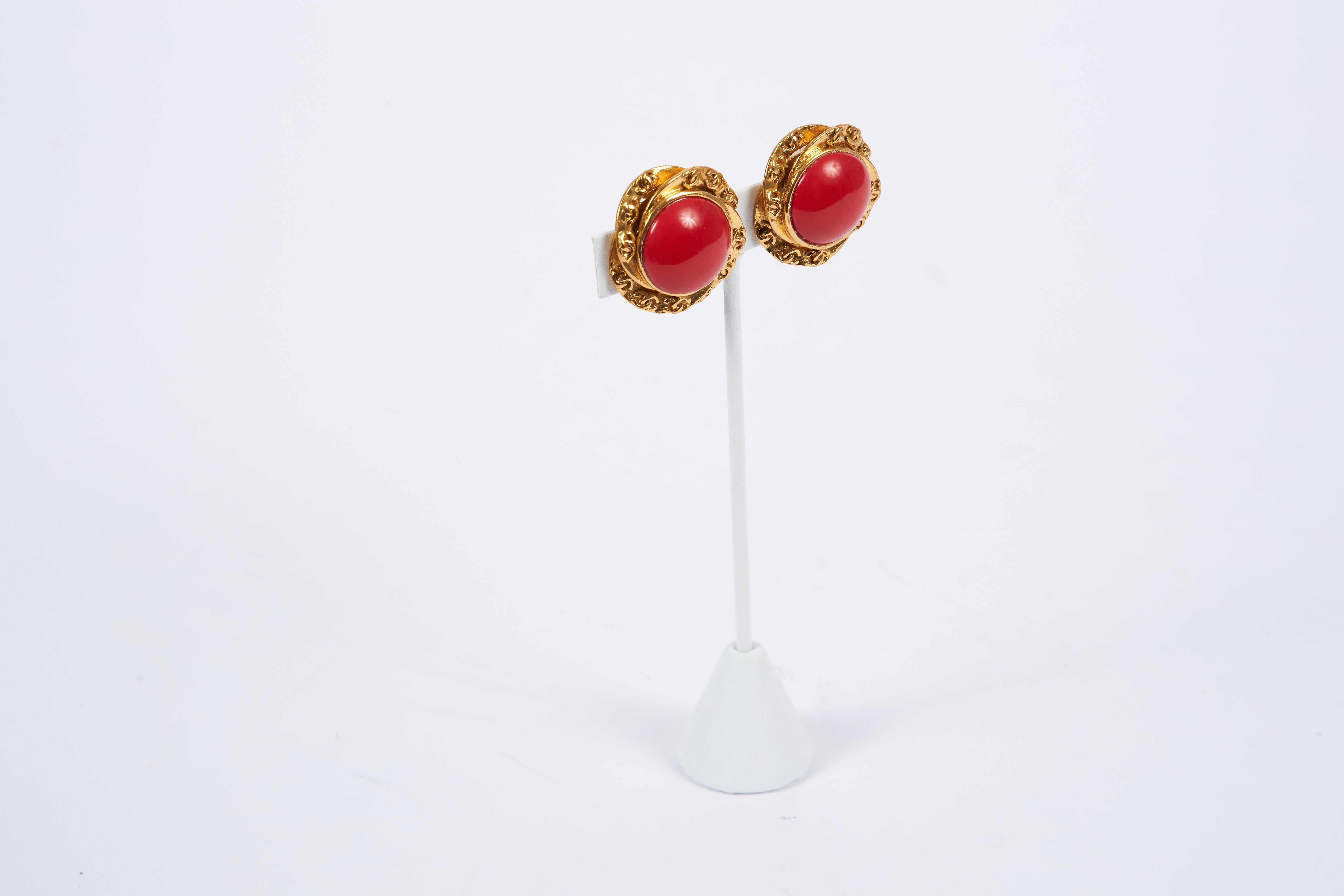 Chanel red poured glass, gripoix, and gold cc metal clip on earrings. Autumn 93 collection, come with original box.

