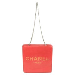 Sac fourre-tout Chanel rouge avec logo CC et chaîne 4ck726a