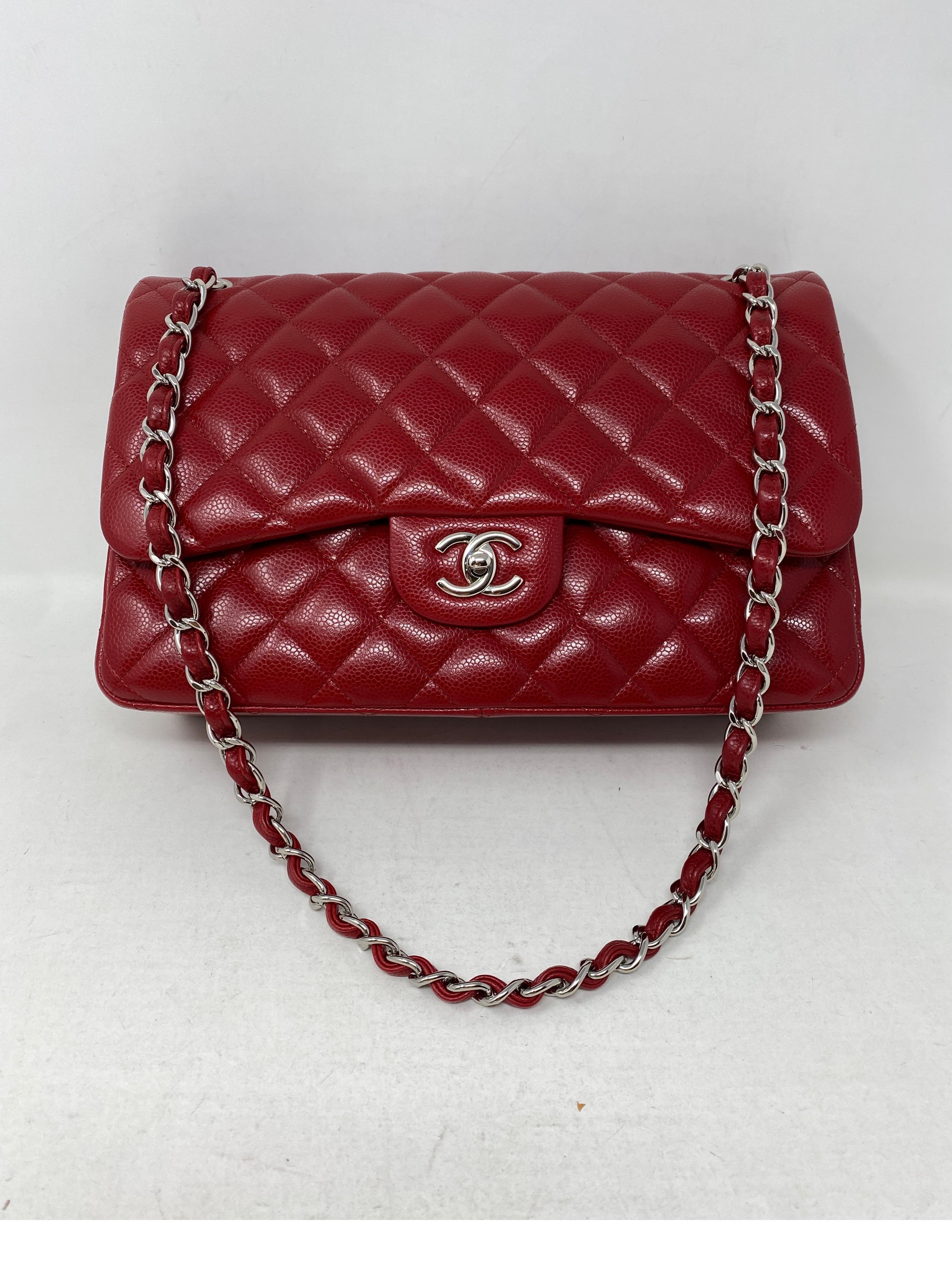 Chanel Red Jumbo Double Flap Bag. Caviar leather with silver hardware. Excellent condition. Beautiful cherry red color. Hard to find combo. Classic Chanels are going up. Serial number is inside bag. Guaranteed authentic. 