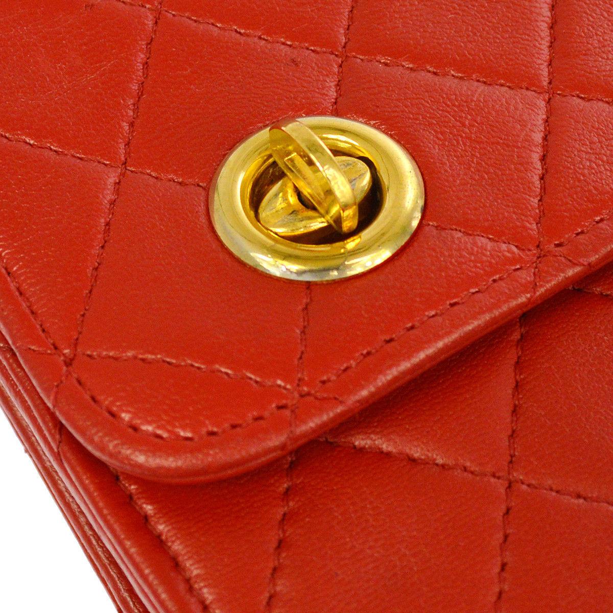 Chanel Red Lambskin Dual Turnlock Top Handle Satchel Shoulder Flap Bag

Lambskin
Gold tone hardware
Dual turnlock closure
Made in France
Handle drop 3