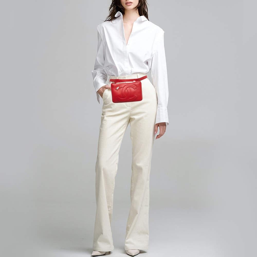 This uber-stylish Chanel waist belt bag aims to be an elevating piece. It is carefully created using red leather and has the CC logo on the front. See how it transforms a T-shirt dress or a solid jumpsuit!

Includes
Authenticity Card, The Luxury