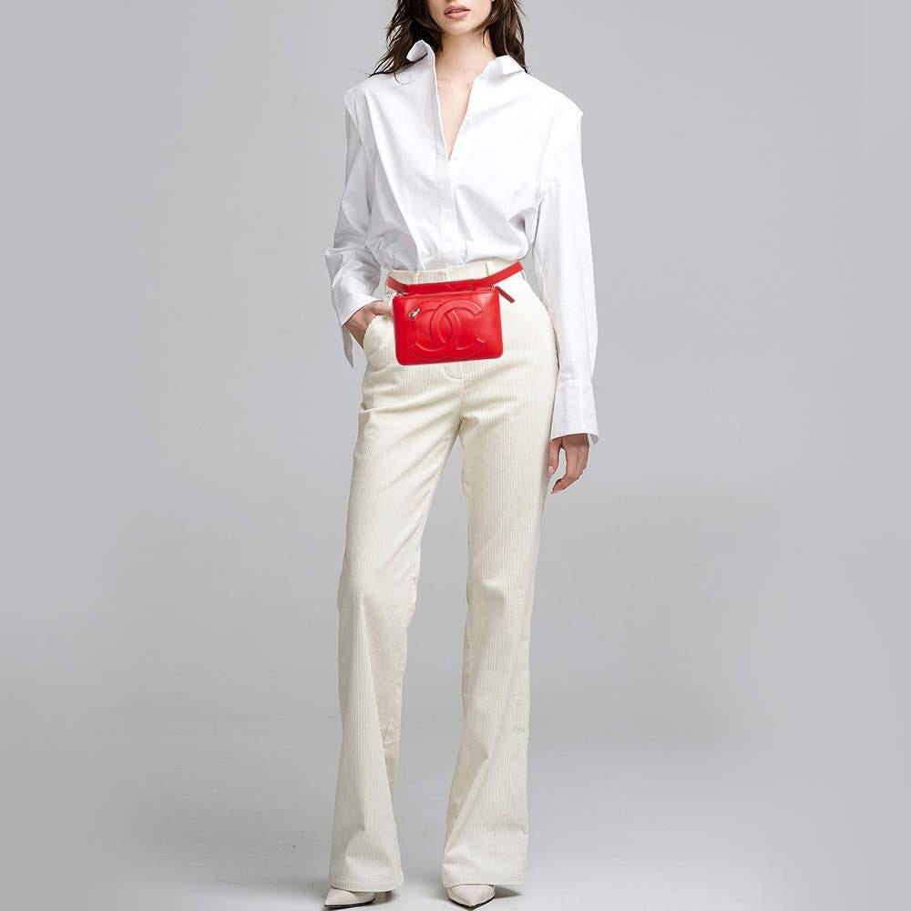The Chanel Mania waist bag is a stylish accessory that combines function and luxury. Crafted from high quality leather it features the iconic CC logo dual zip compartments and an adjustable belt.