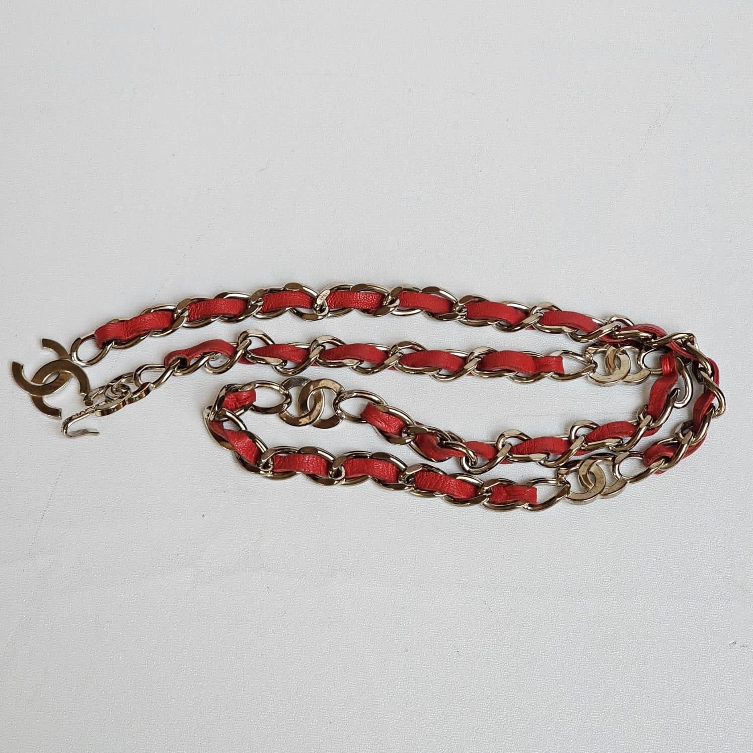 Rare chanel red leather interwoven chain waist belt in silver. Rare color combination. Embellished with CC detailed throughout. Can be worn as necklace as well. Overall in great condition. Comes as is.