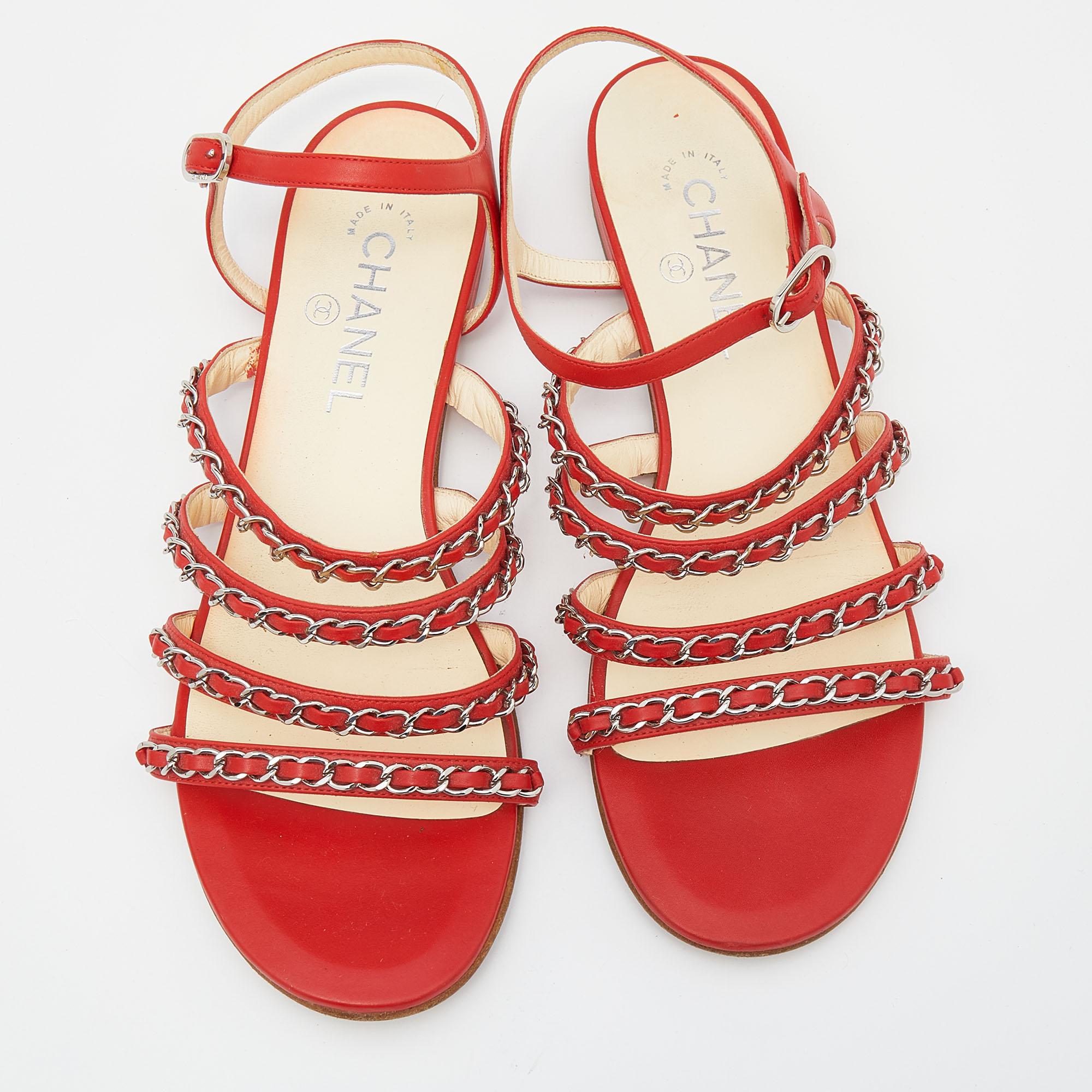 You'll love how these leather sandals from Chanel will be perfect for every season. They flaunt chain-detailed upper straps, simple ankle fastenings, and the CC logo on the heels.

