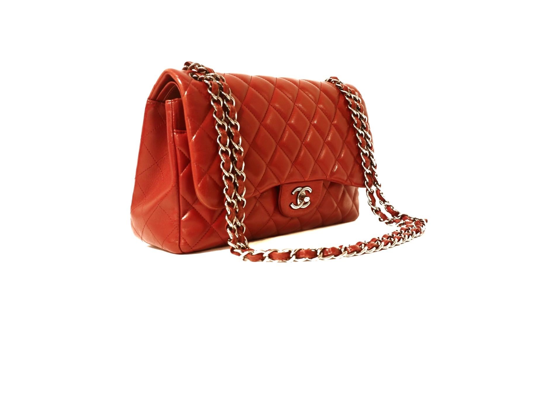 This authentic Chanel Red Leather Classic Double Flap Bag is in very good condition.  Truly striking in bright lipstick red leather, the timeless Classic Flap is a must have in any collection. 
Red leather is quilted in signature Chanel diamond