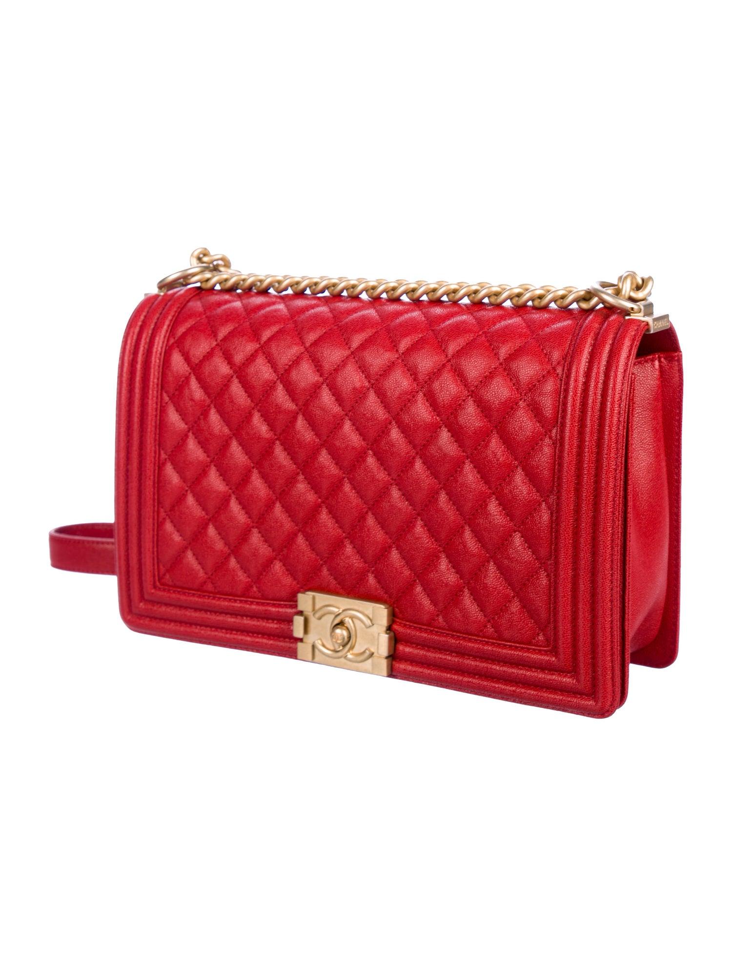 Chanel Red Leather Gold Jumbo Large Boy Evening Shoulder Bag in Box

Leather
Gold-tone hardware
Grosgrain lining
Push-lock closure
Date code present
Made in France
Shoulder strap drop 20