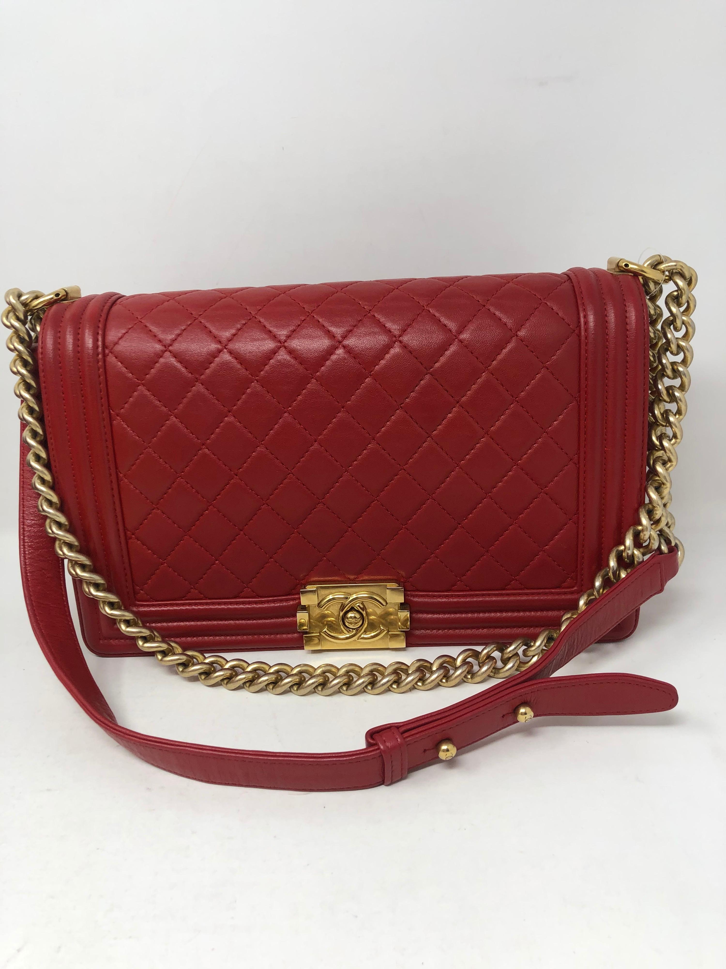 Chanel Red Old Medium Boy Bag. Gold hardware. Lambskin leather. Beautiful true red color. Excellent condition. Hard to find combo. Can be worn crossbody or doubled as a shoulder bag. Serial number intact. Guaranteed authentic. 