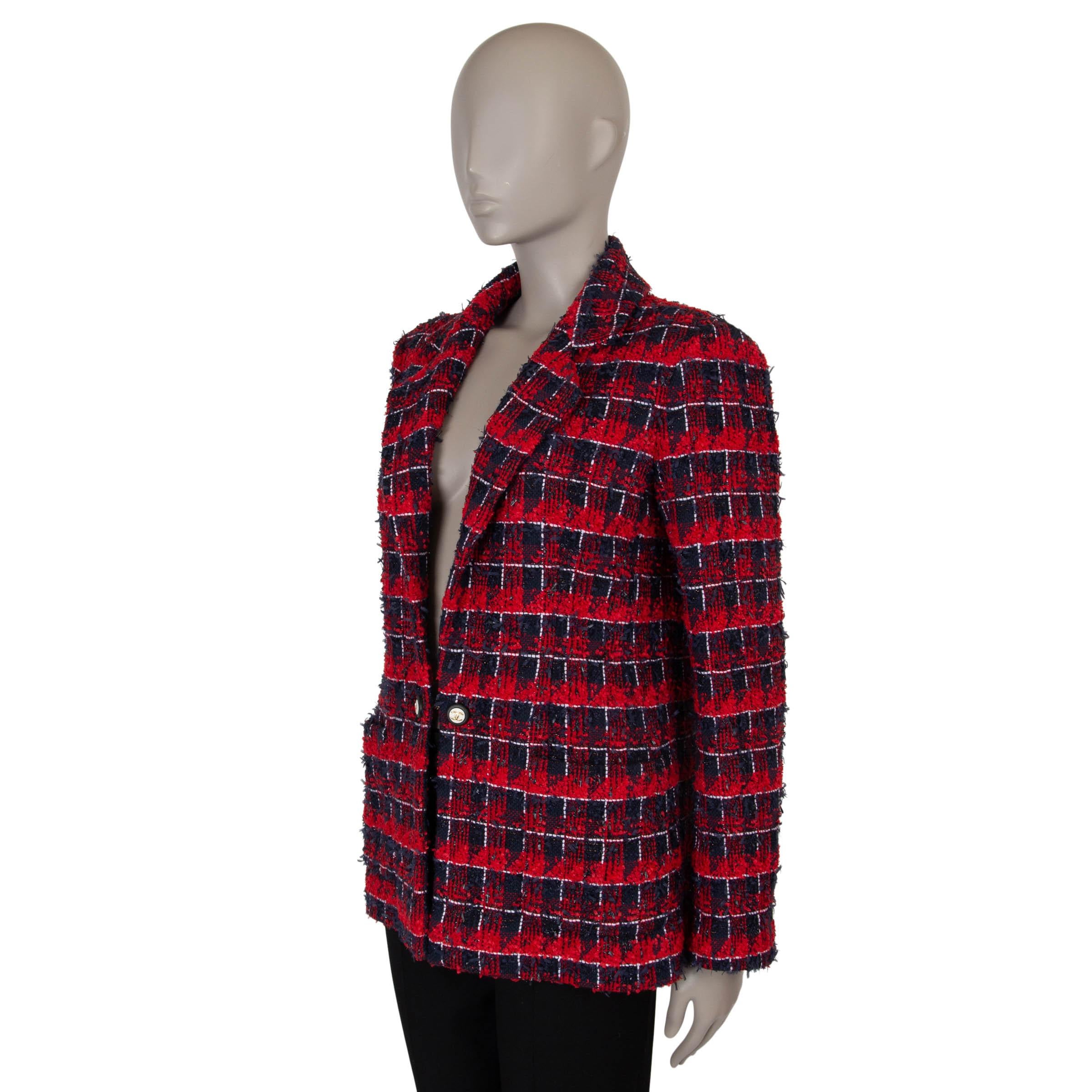 This 100% authentic Chanel 2024 cotton tweed jacket combines timeless elegance with a modern twist. Crafted from a vibrant red, navy, black, and white cotton tweed blend (48% cotton, 39% polyamide, 8% wool, 3% viscose, 2% polyester), it features a