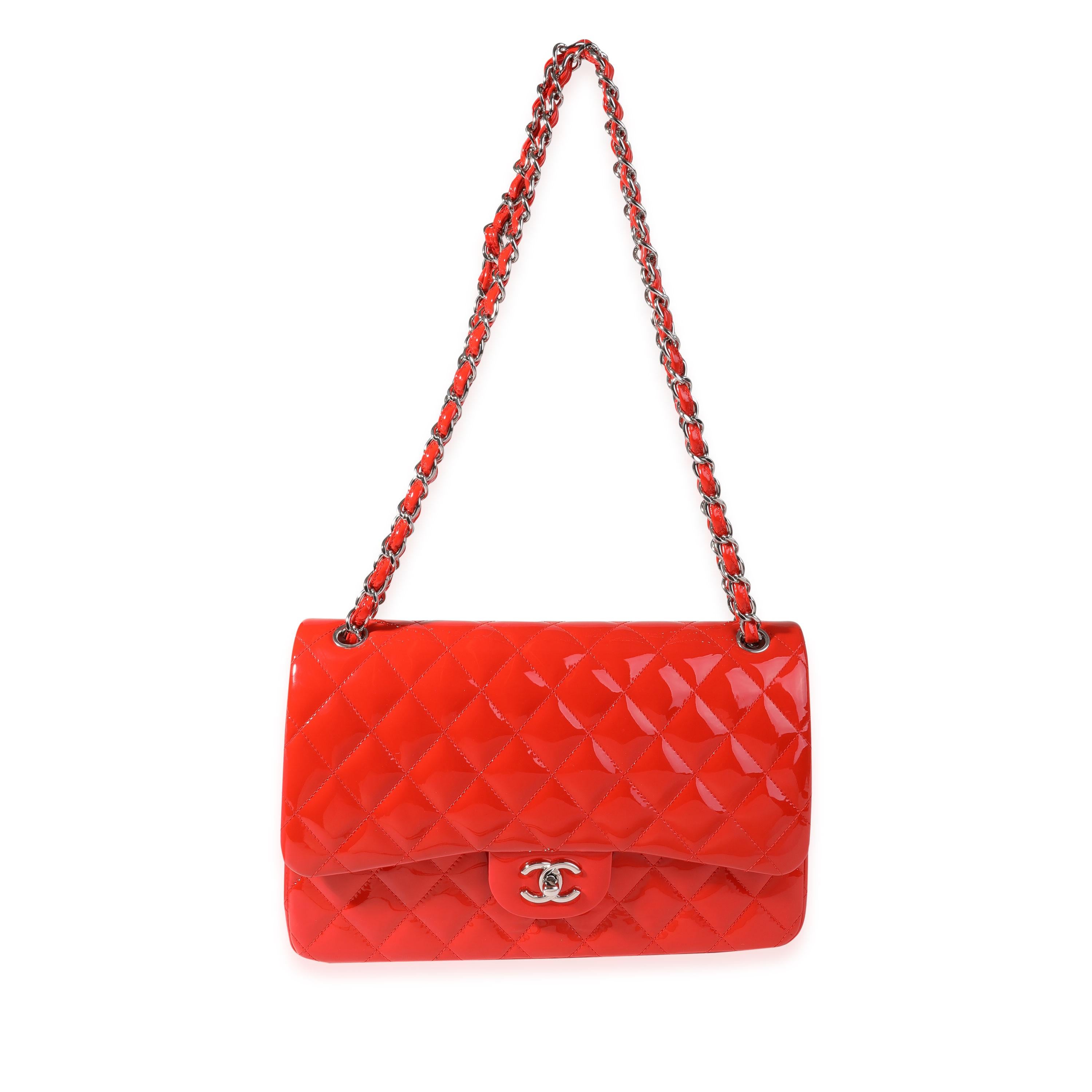 Listing Title: Chanel Red Patent Classic Jumbo Double Flap Bag
SKU: 119675
MSRP: 9500.00

Handbag Condition: Never Worn
Brand: Chanel
Model: Red Patent Classic Jumbo Double Flap Bag
Origin Country: Italy
Handbag Silhouette: Shoulder Bag
Occasions:
