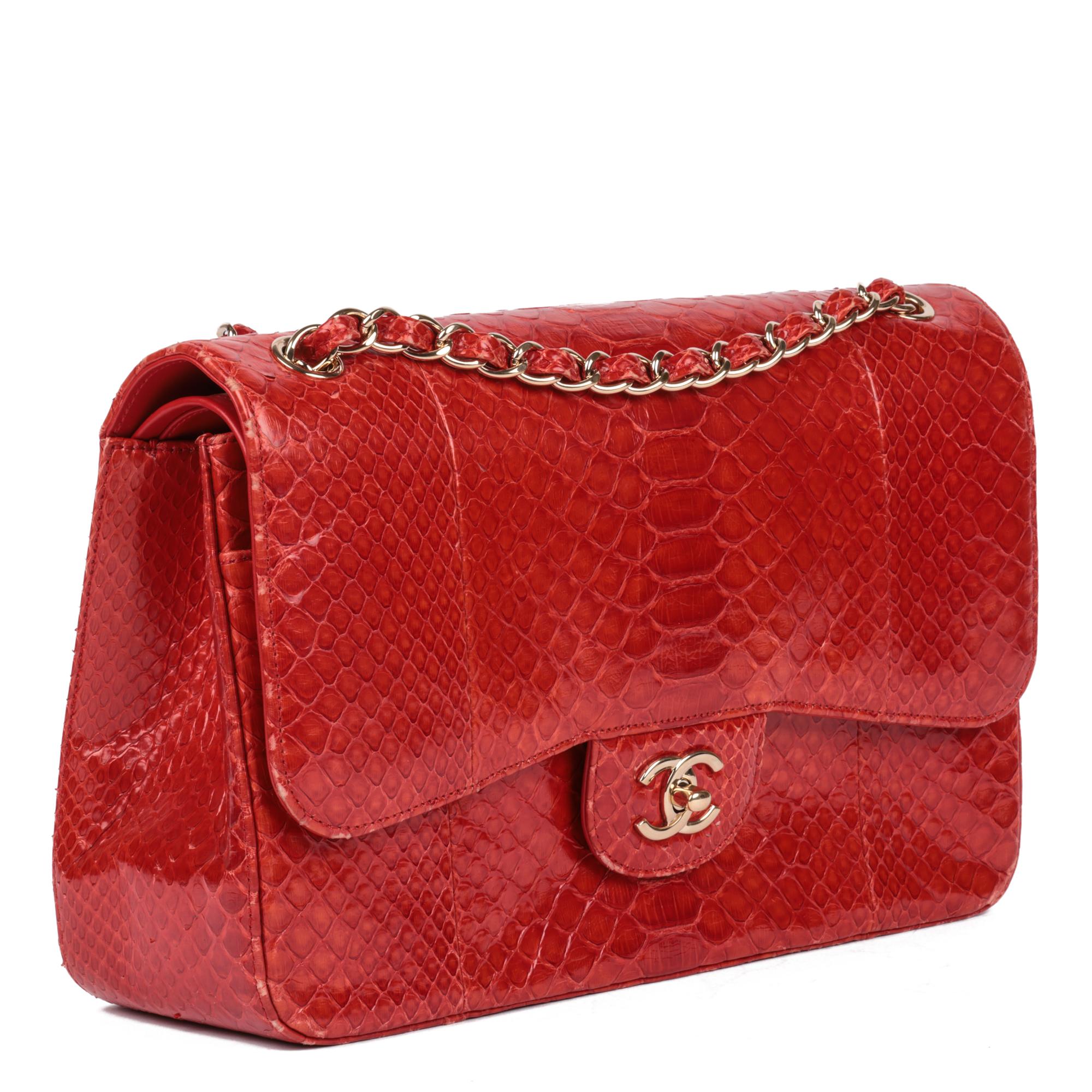 CHANEL
Red Python Leather Jumbo Classic Double Flap Bag 

Xupes Reference: CB837
Serial Number: 19198215
Age (Circa): 2014
Accompanied By: Chanel Dust Bag, Authenticity Card 
Authenticity Details: Authenticity Card, Serial Sticker (Made in