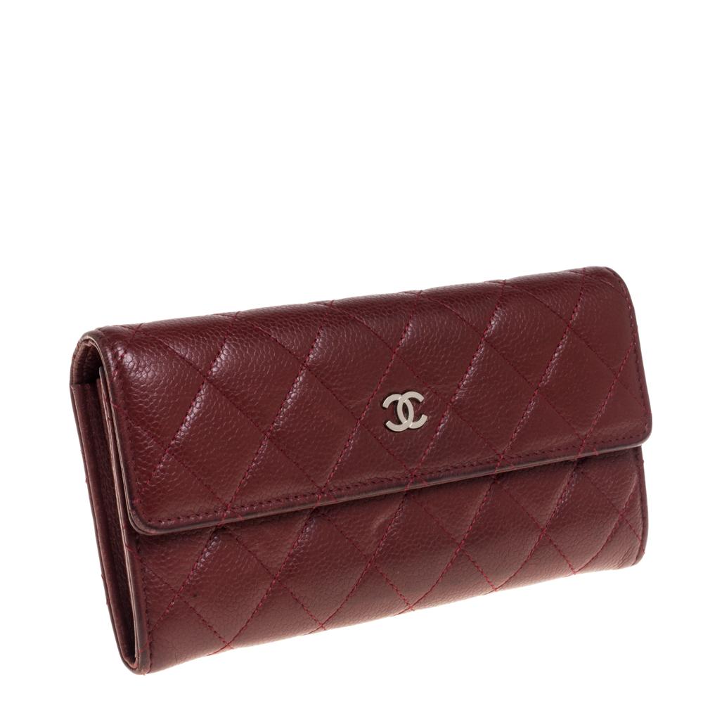 This gorgeous wallet from the house of Chanel is crafted from Caviar leather and carries a lovely quilted exterior. Styled with a CC-adorned flap, the wallet is equipped with multiple slots and a compartment to carry your necessities. This wallet is