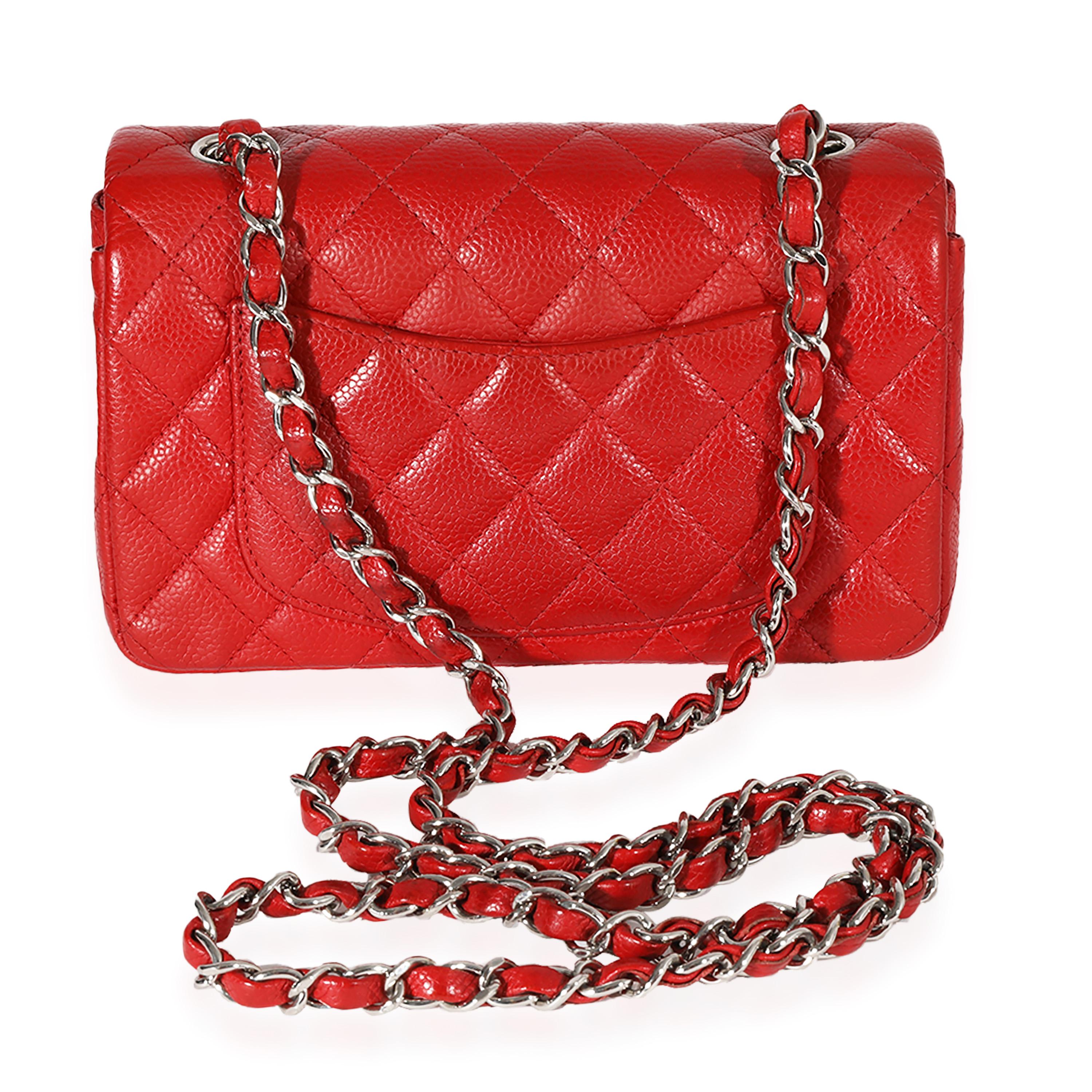 Listing Title: Chanel Red Quilted Caviar Mini Rectangular Classic Flap
SKU: 123155
Condition: Pre-owned 
Handbag Condition: Very Good
Condition Comments: Very Good Condition. Light discoloration and creasing to leather. Light loose threads to