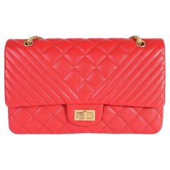Borsa Chanel Red Quilted Caviar Reissue 2.55 227 con doppia pattina