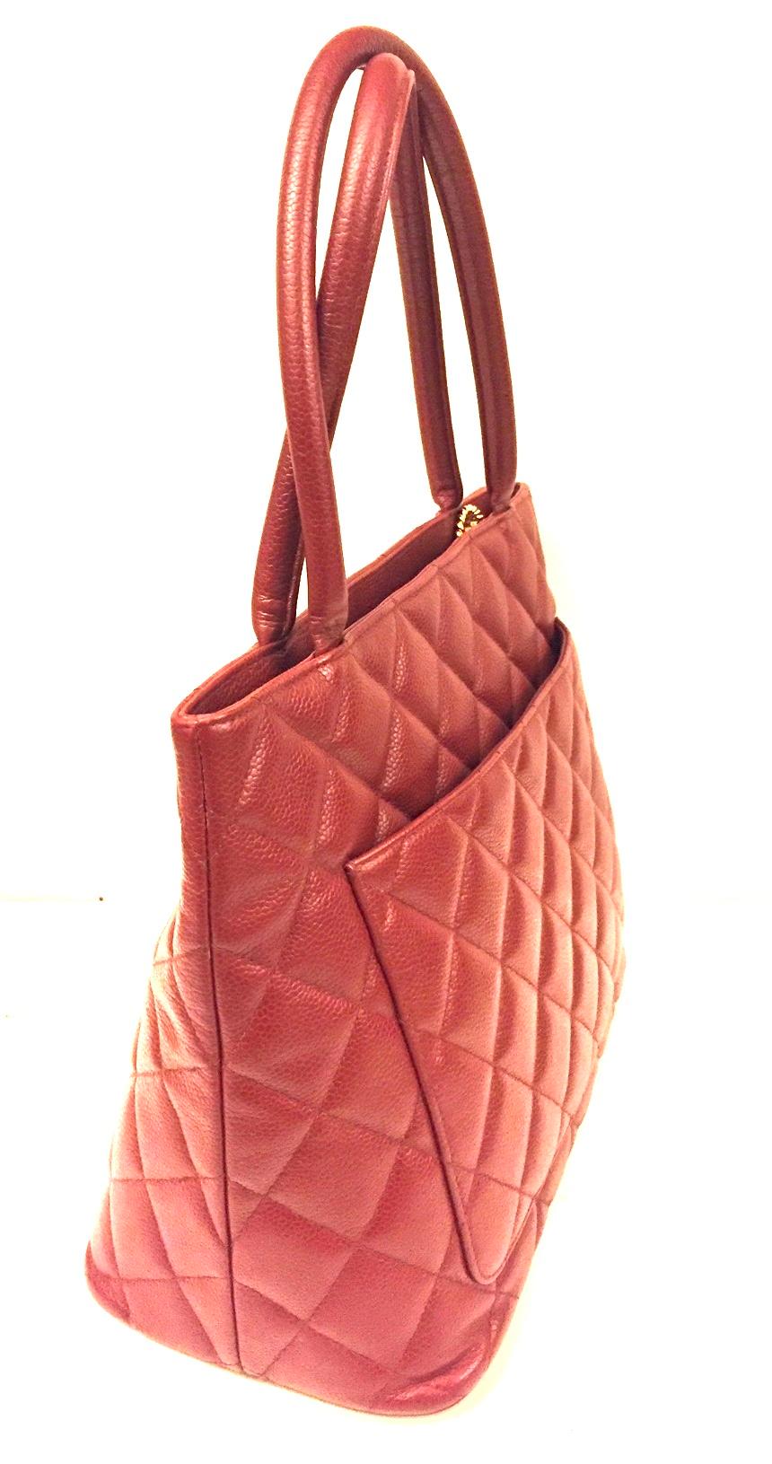 red padded tote bag