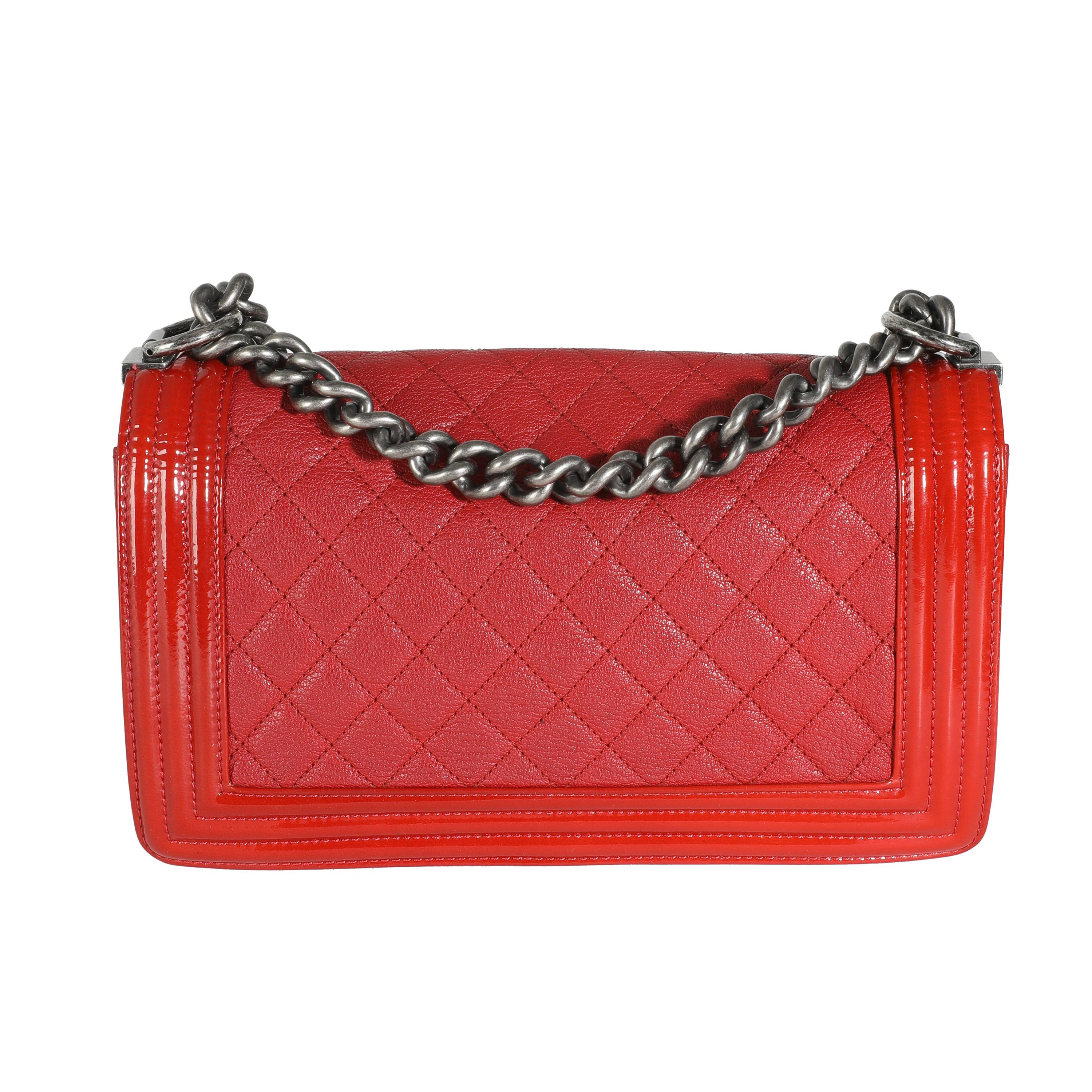 Listing Title: Chanel Red Quilted Goatskin Medium Boy Bag
SKU: 143863
Condition: Pre-owned 
Condition Description: An instant classic, the Boy bag from Chanel was introduced in 2011. The quilted bag was designed by the late Karl Lagerfeld, who was