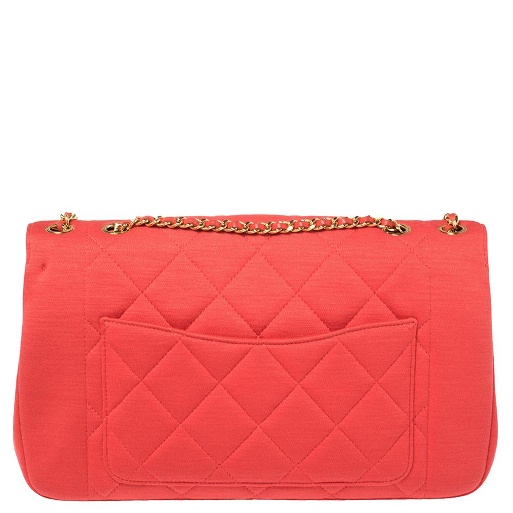Chanel's Flap Bags are iconic and monumental in the history of fashion. This Diana bag is a buy that is worth every bit of your splurge. Crafted from red jersey fabric, it bears the signature quilt pattern and the iconic CC twist lock on the flap.