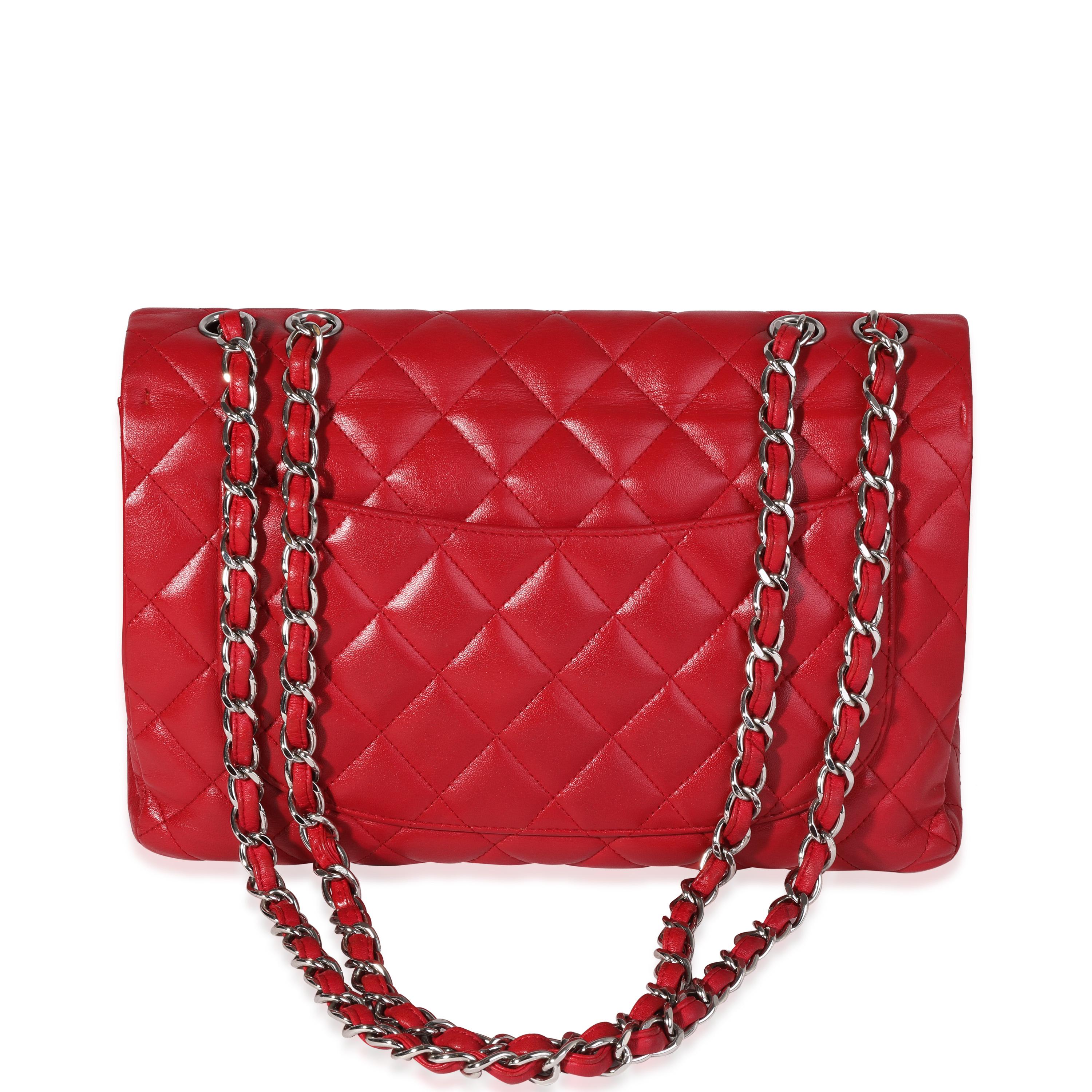 Listing Title: Chanel Red Quilted Lambskin Jumbo Classic Single Flap Bag
SKU: 120351
MSRP: 9500.00
Condition: Pre-owned 
Handbag Condition: Very Good
Condition Comments: Very Good Condition. Re-Painted. Creasing to exterior leather. Light scratching