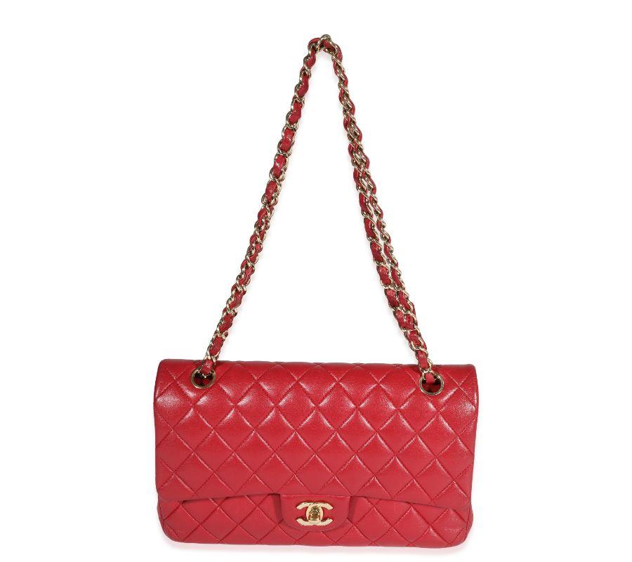 Listing Title: Chanel Red Quilted Lambskin Medium Classic Double Flap Bag
SKU: 122906
MSRP: 8800.00
Condition: Pre-owned 
Handbag Condition: Very Good
Condition Comments: Very Good Condition. Plastic at some hardware. Heavy scuffing at corners and